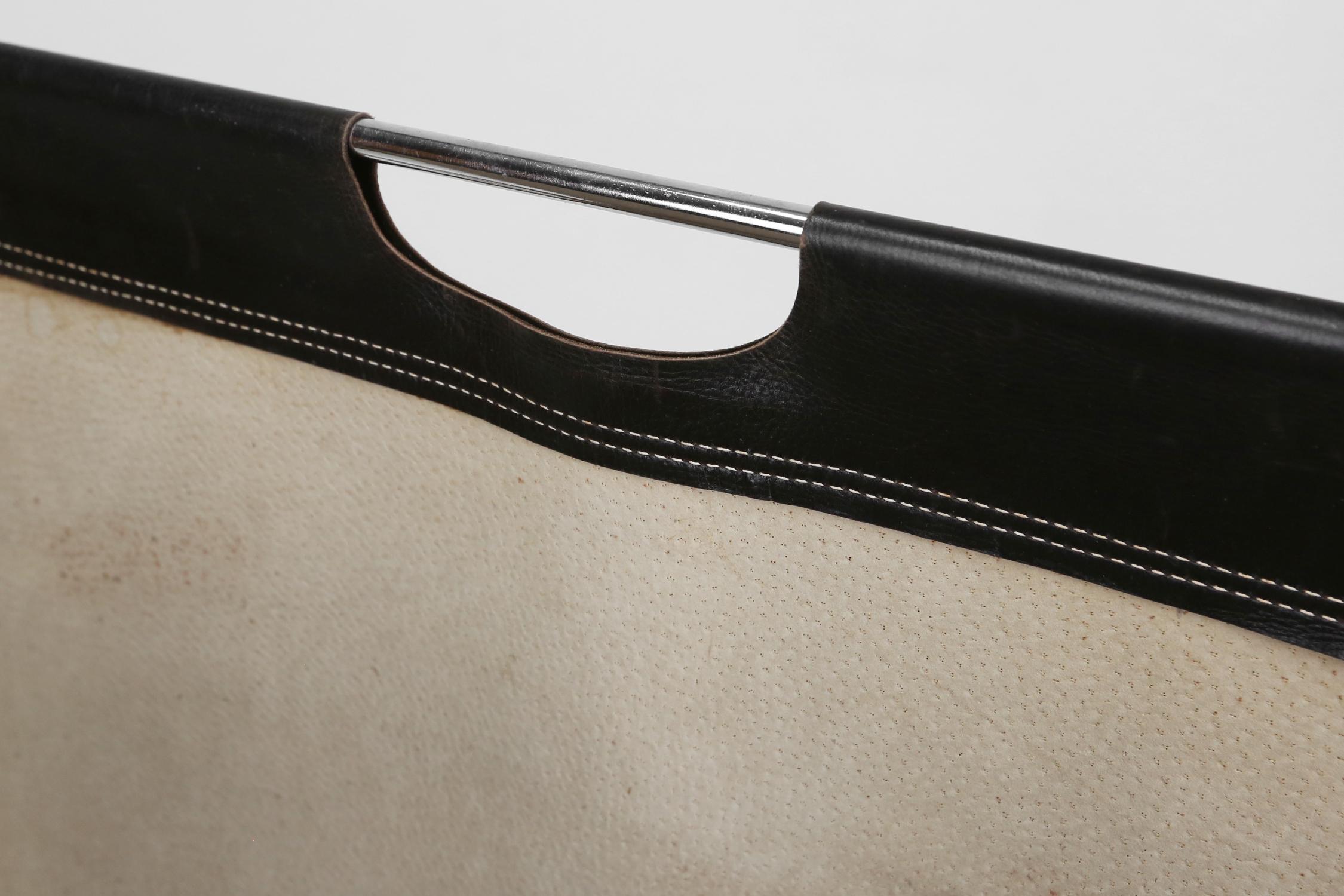 Mid-Century Modern Folding magazine rack by Jacques Adnet in metal and Leather, France 1950s For Sale