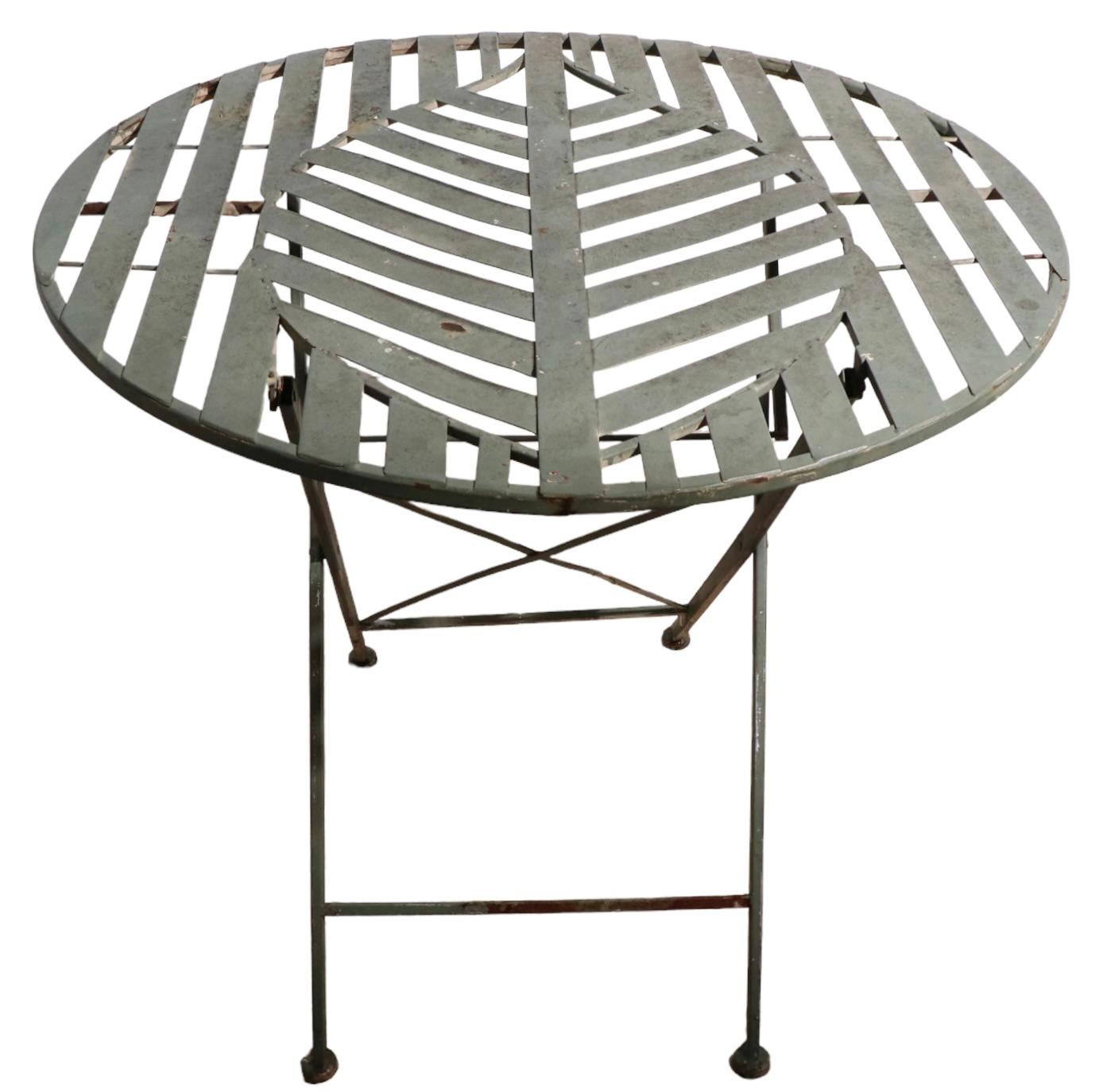 Folding Metal Garden Patio Poolside Table with Stylized Leaf Motif Top For Sale 8