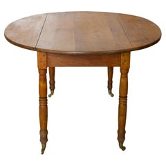 Antique Folding Oval Walnut Table with Wheels