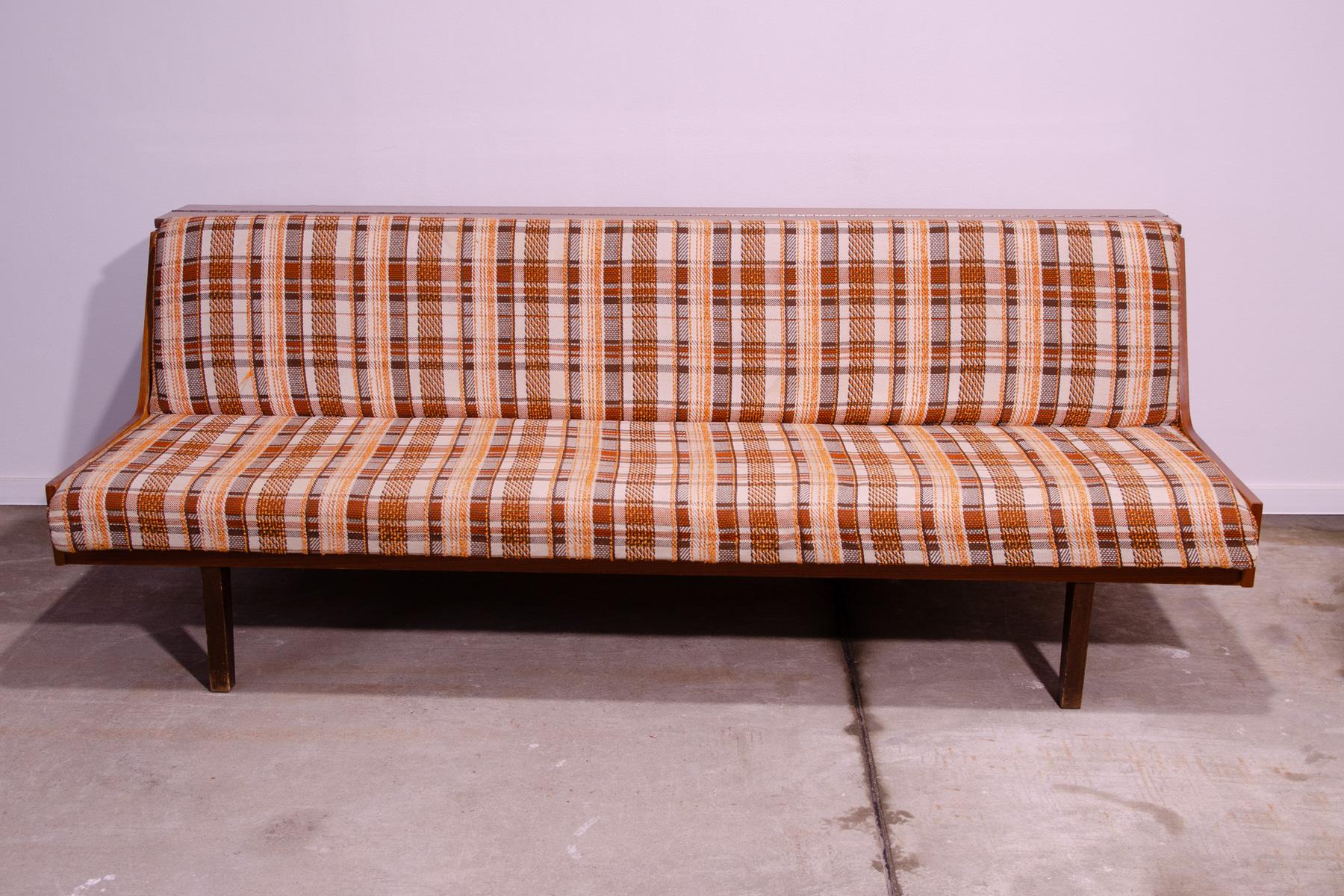 This Scandinavian style sofabed was made in the former Czechoslovakia in the 1970s.  The sofa has a wooden structure with ash wood veneer, overall it´s in very good Vintage condition, shows slight signs of age and using.

Lenght: 200 cm

Height: 75