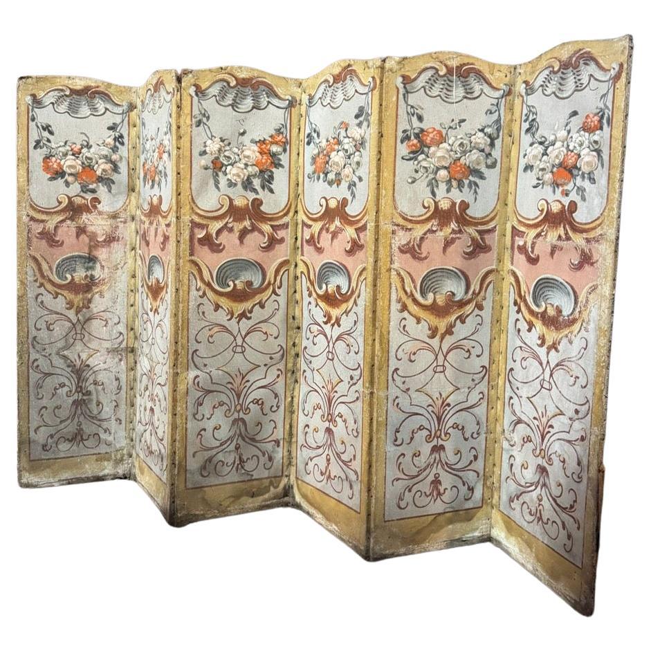 Folding screen on canvas painted with rich floral and leafy decorations, Italy For Sale