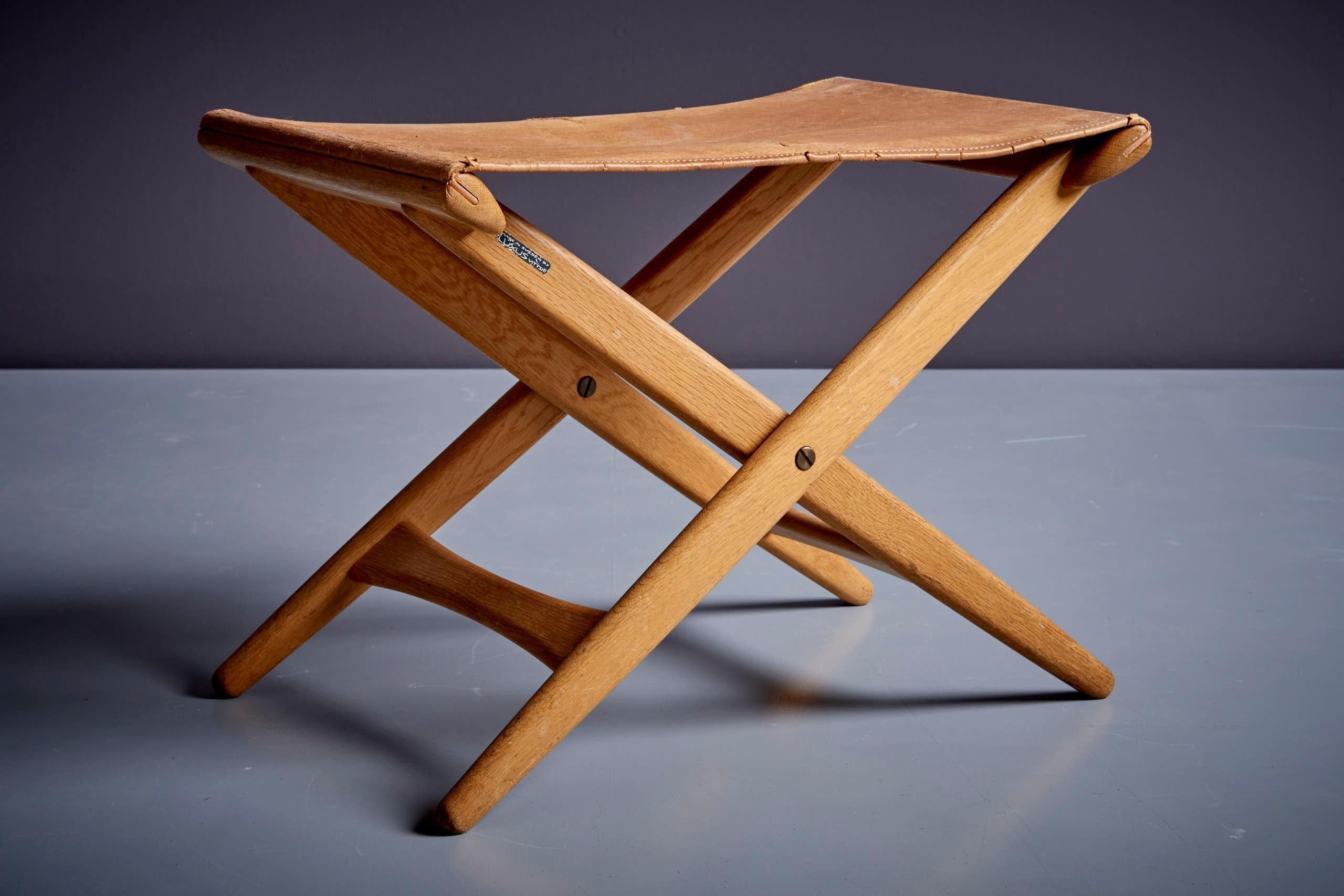 Luxus Vittsjö folding stool in original vintage condition with natural leather cover on solid oak.