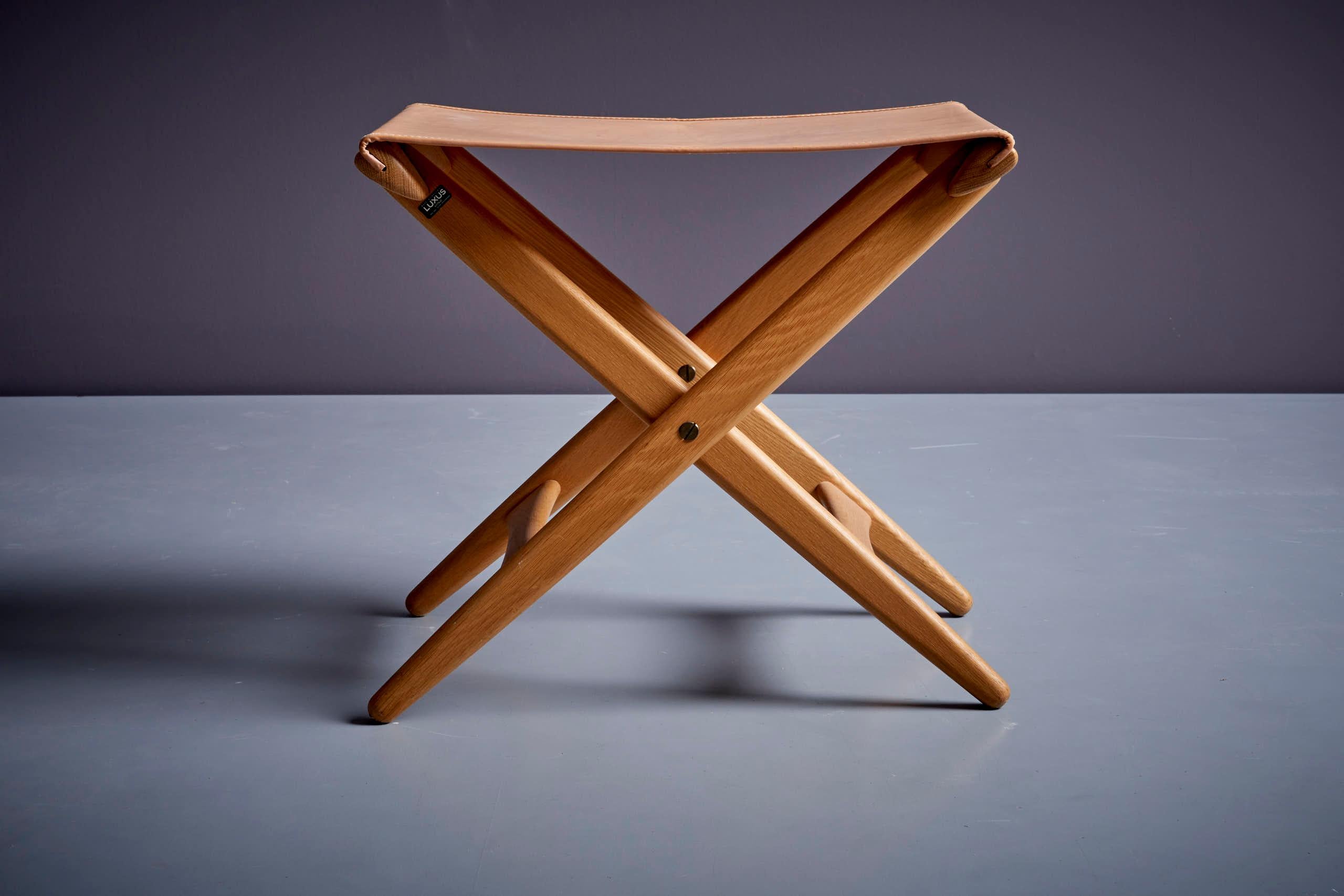 Luxus Vittsjö folding stool in original condition with natural leather cover.

 