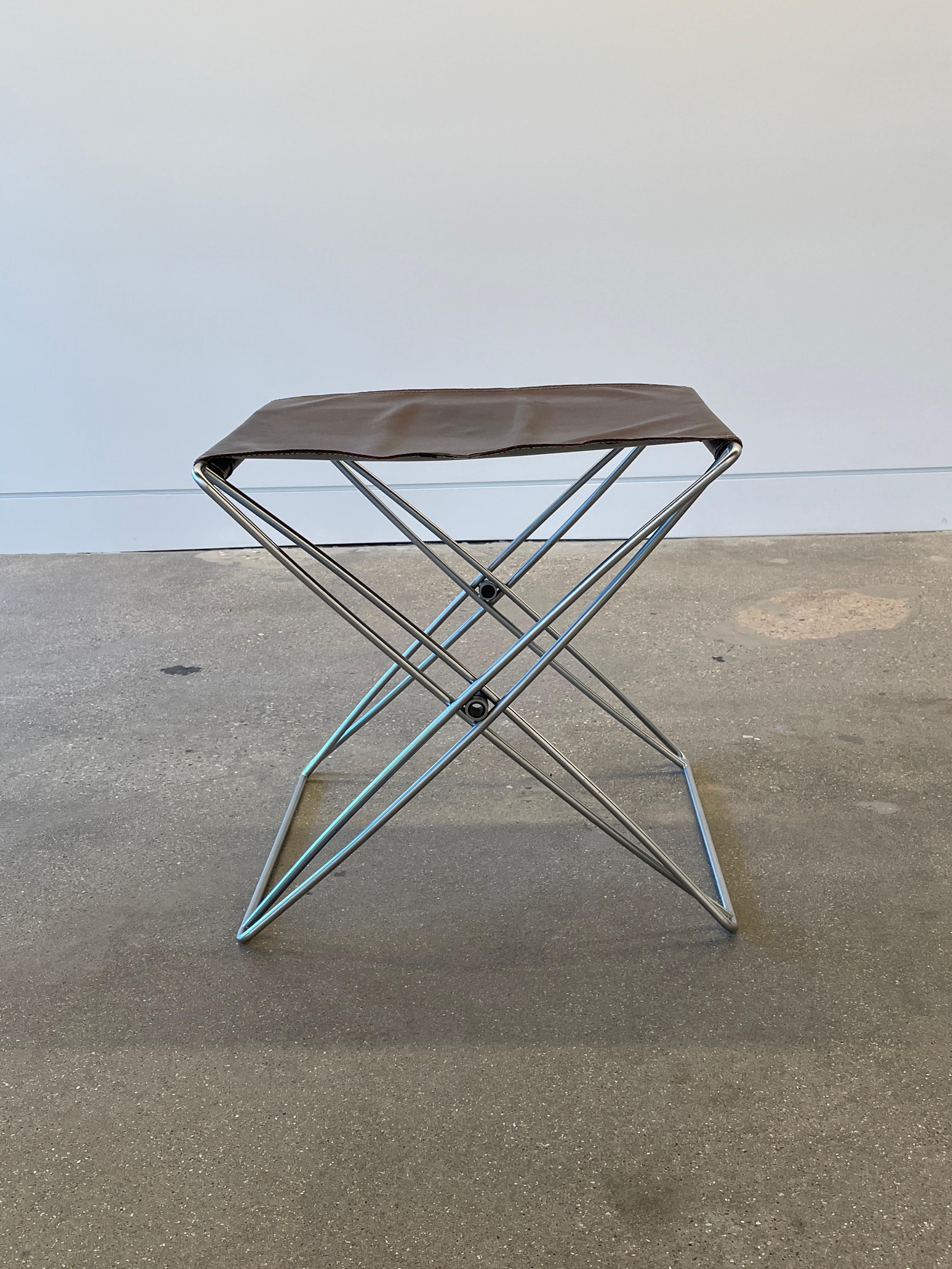 Jörgen Gammelgaard folding stool for Design Forum, Denmark, 1970s. 

Additional Information:
Materials: Chrome-plated steel, leather
Dimensions: 19 1/2