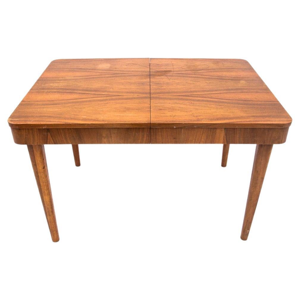 Folding table from the mid-20th century, designed by J. Halabal. Currently under renovation, the price includes. 

Dimensions: height 77 cm / length 120 - 190 cm / depth. 85 cm.