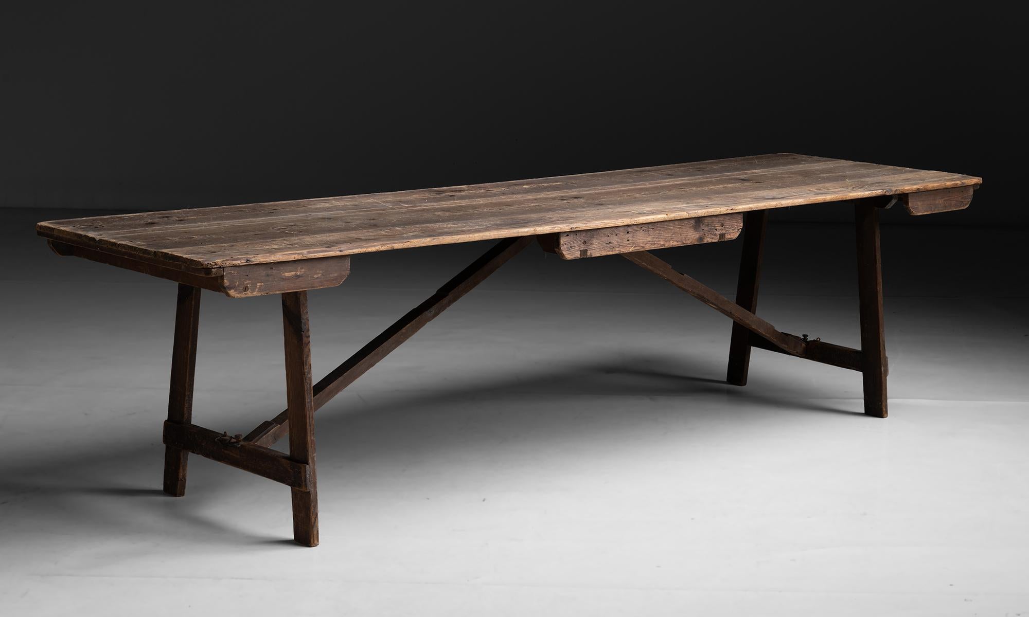 Folding Table

England circa 1890

Composed of pine.

Measures 107.25”L x 31.75”d x 27.75”h
