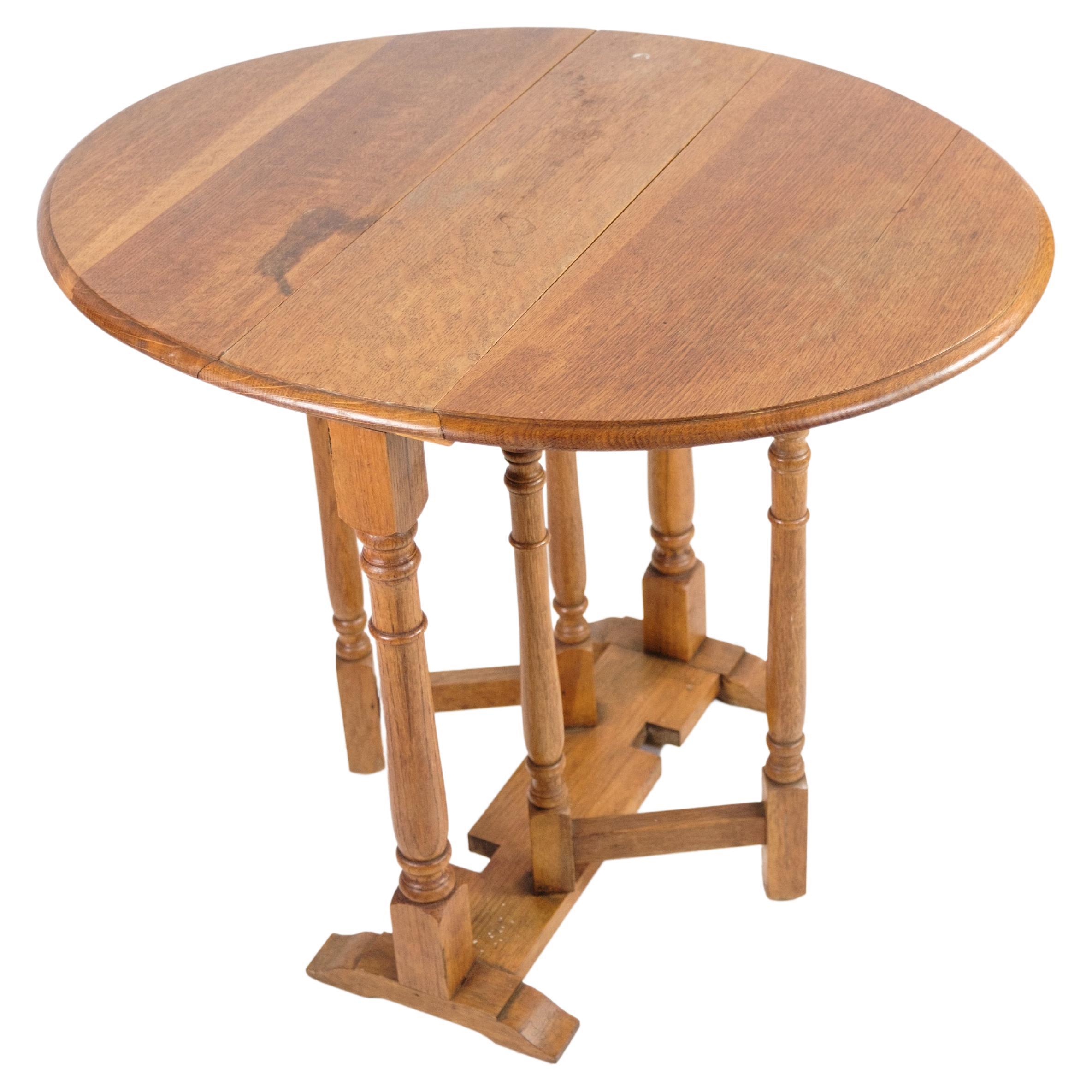 Table pliante en chêne des années 1890