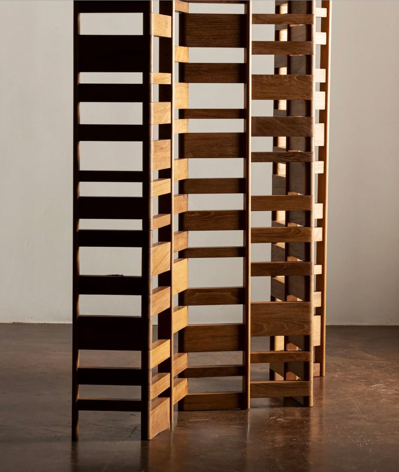 Amsterdam-based design duo Xander Vervoort and Leon van Boxtel designed this folding screen using remnant pieces of teak leftover from the creation of other designs. Handcrafted by traditional craftspeople in Bangalore, India in reclaimed or