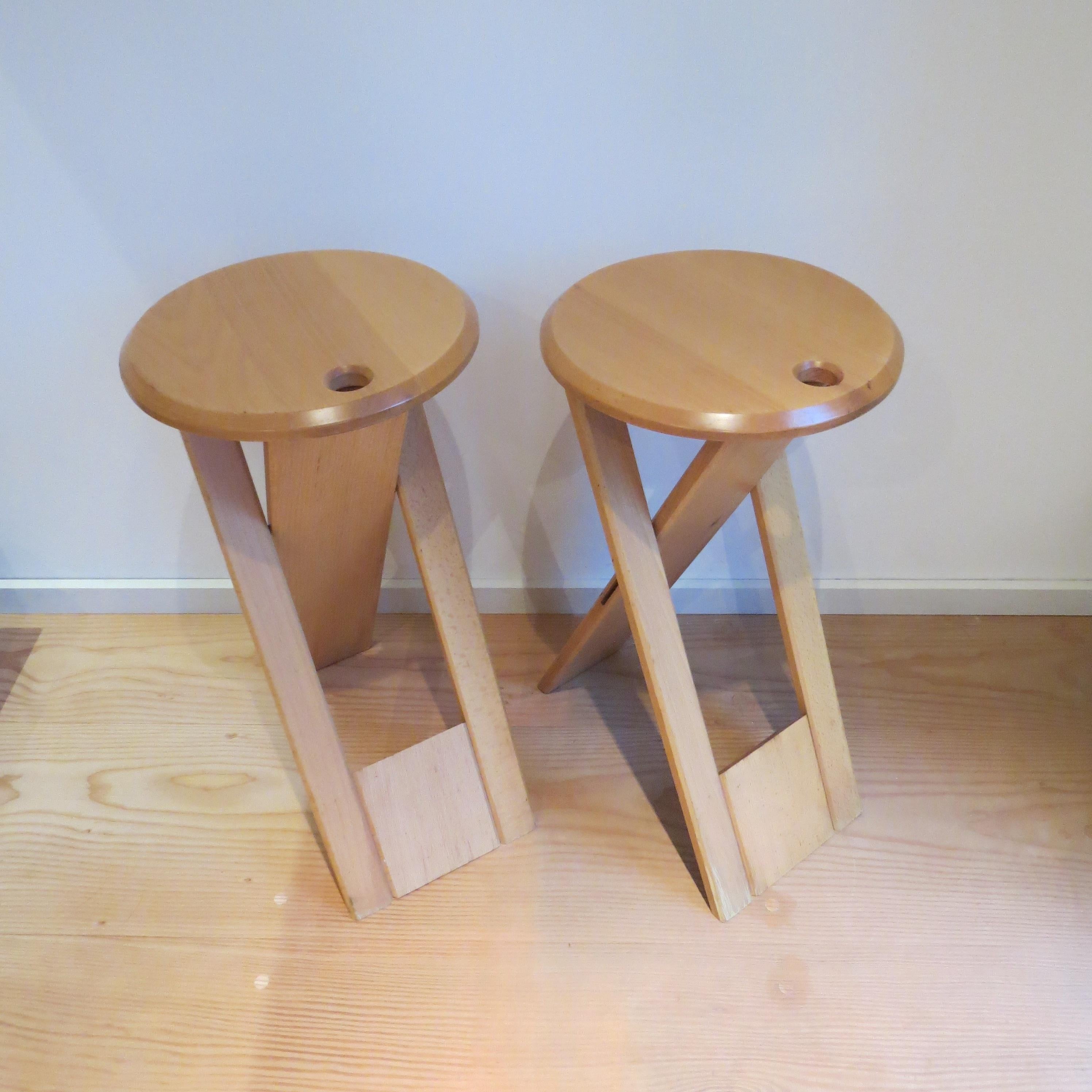 Pair of  folding Suzy stools, designed by Adrian Reed and produced by Princes Design Works in 1984-1985.
Made from solid Beech, the stools fold and can be hung up for ease of storage.
Good vintage condition, general signs of use.



  