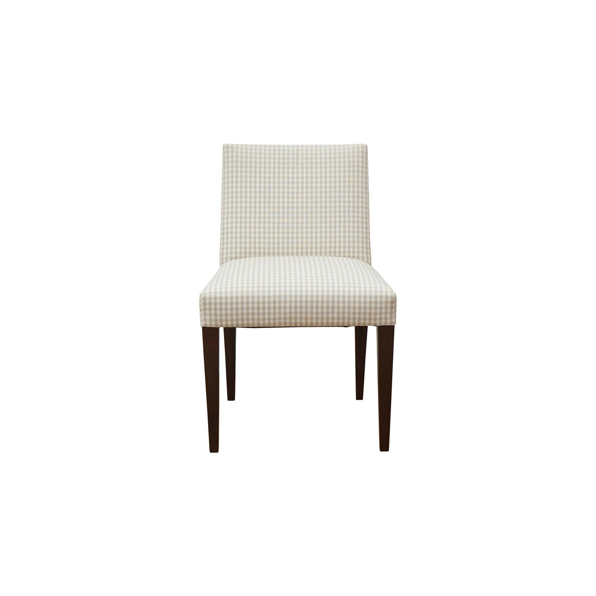 Drawing inspiration from a classic 1950s Dunbar design, this Kirby dining side chair is from the foley&cox HOME Collection of custom furniture. Featuring elegantly tapered legs with tight seat and back upholstery, the chair is available in choice of