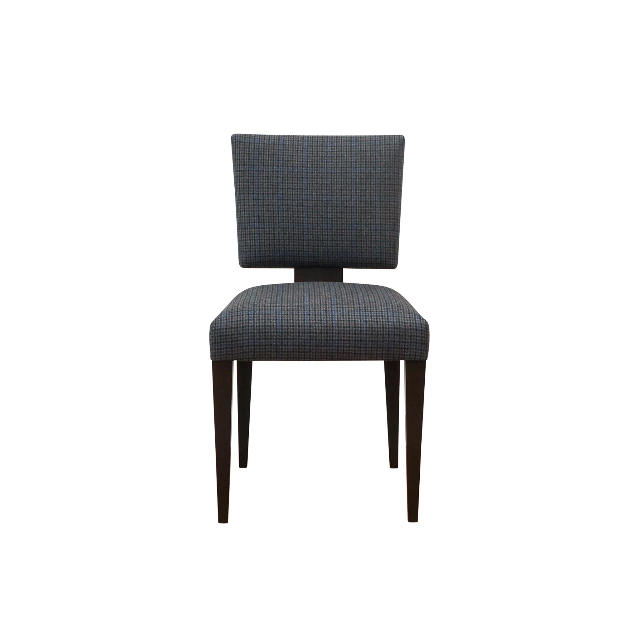 Interpreted from a classic 1950's Dunbar design, the Claudette Dining/Side Chair is from the foley&cox HOME Custom Collection. The walnut frame with tapered legs and back splat is available in three finish options: mocha walnut (shown), light