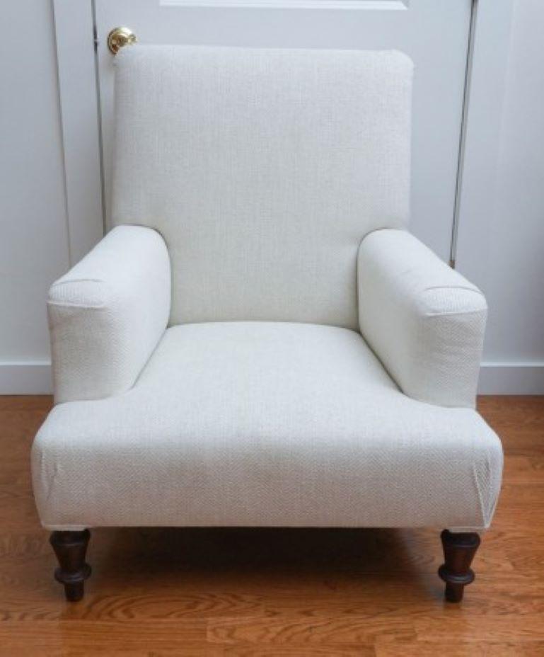 Stunning French upholstered club chair shown in dark mahogany. Custom finishes also available in cerused oak, mahogany, mocha walnut.

COM: 10 yards, 54