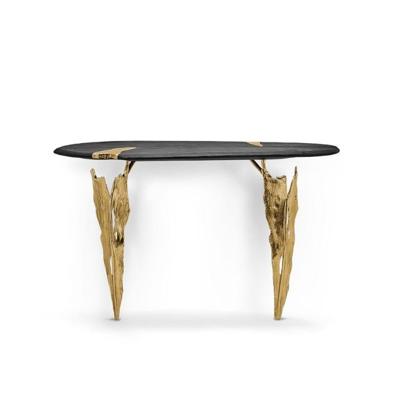 Folia console stands as a bold statement, elevating your decor to unparalleled heights. Its meticulously crafted shape and texture cast shadows and play with light, enriching the atmosphere of any room with a dash of natural sophistication. Whether
