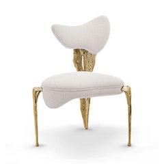 Folia - Sedia scultorea in finitura bianco sporco con Silhouette organica