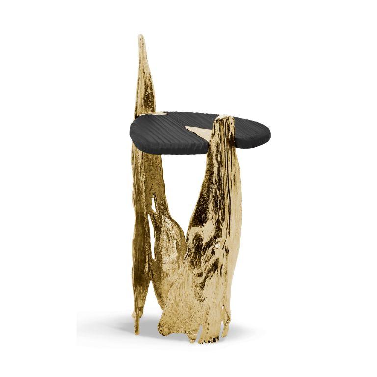 Folia Side Table, is a testament to the marriage of artistic inspiration and impeccable craftsmanship, delicately echoing the timeless beauty of a palm tree bark. More than a functional piece, the Folia Side Table is a statement of refined