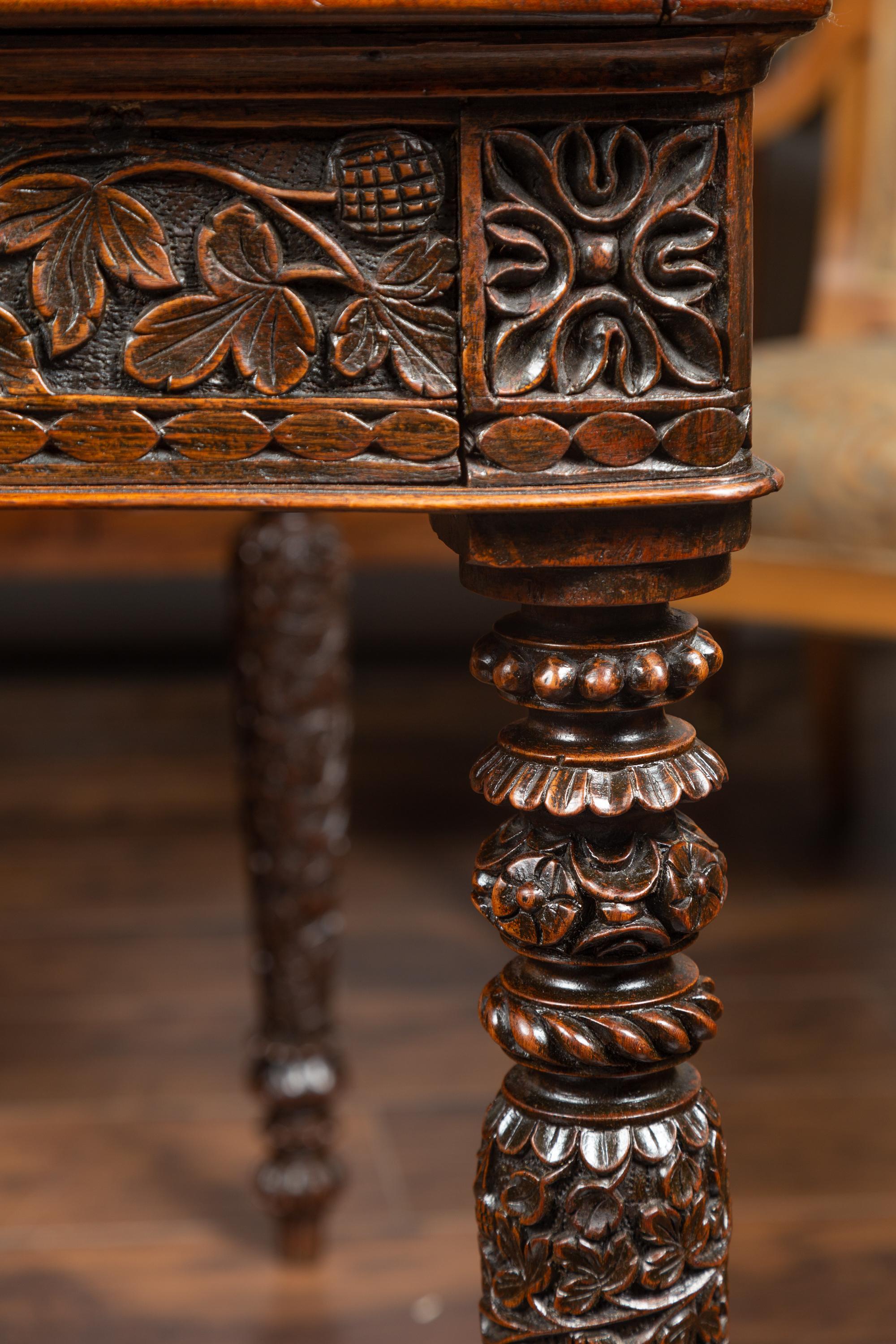 Foliage Carved 1900s Anglo-Indian Table with Two Drawers and Turned Legs 13