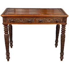 Foliage Carved 1900s Anglo-Indian Table with Two Drawers and Turned Legs