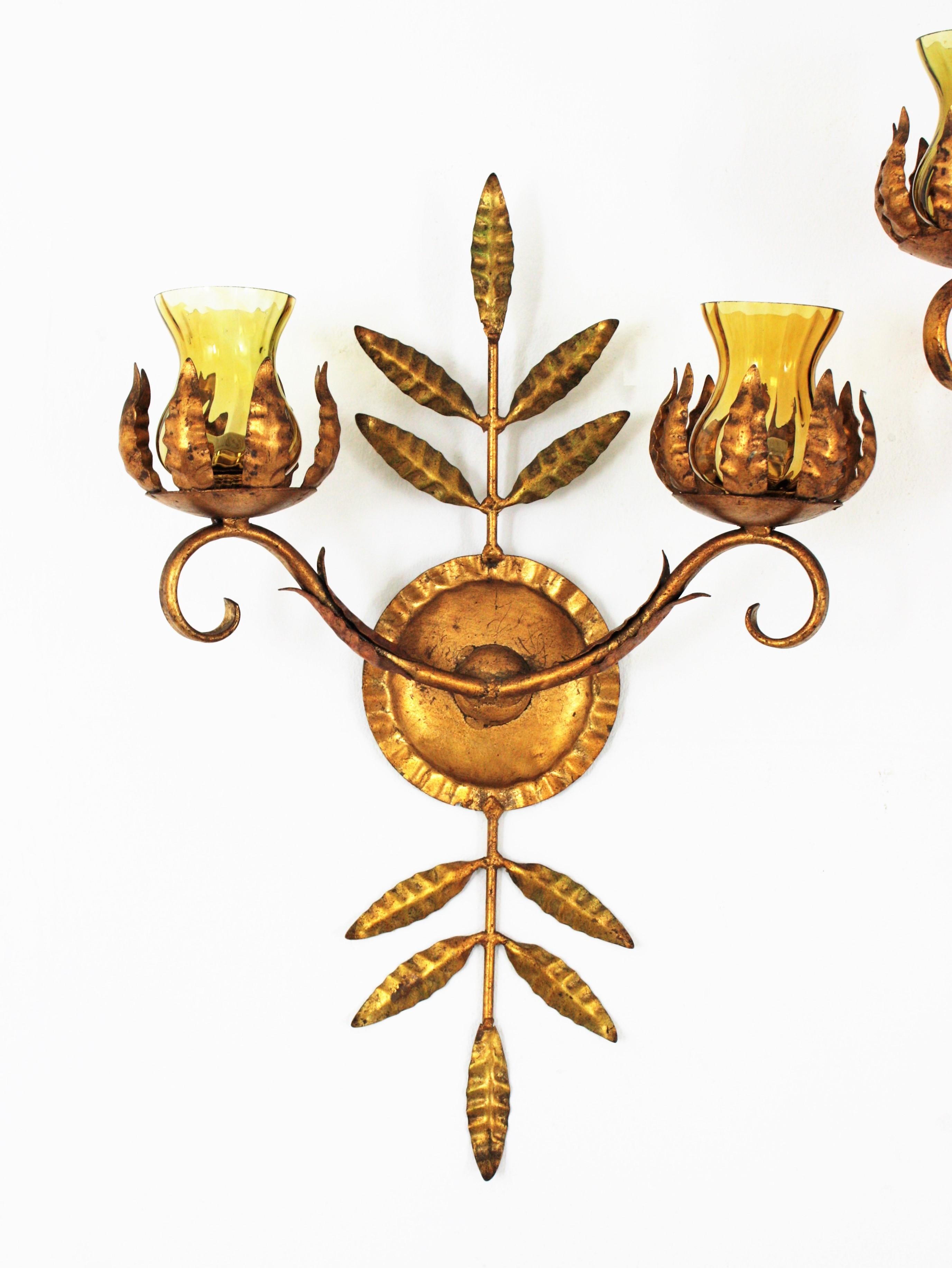Metal Pair of Spanish Wall Sconces in Gilt Iron and Amber Glass For Sale
