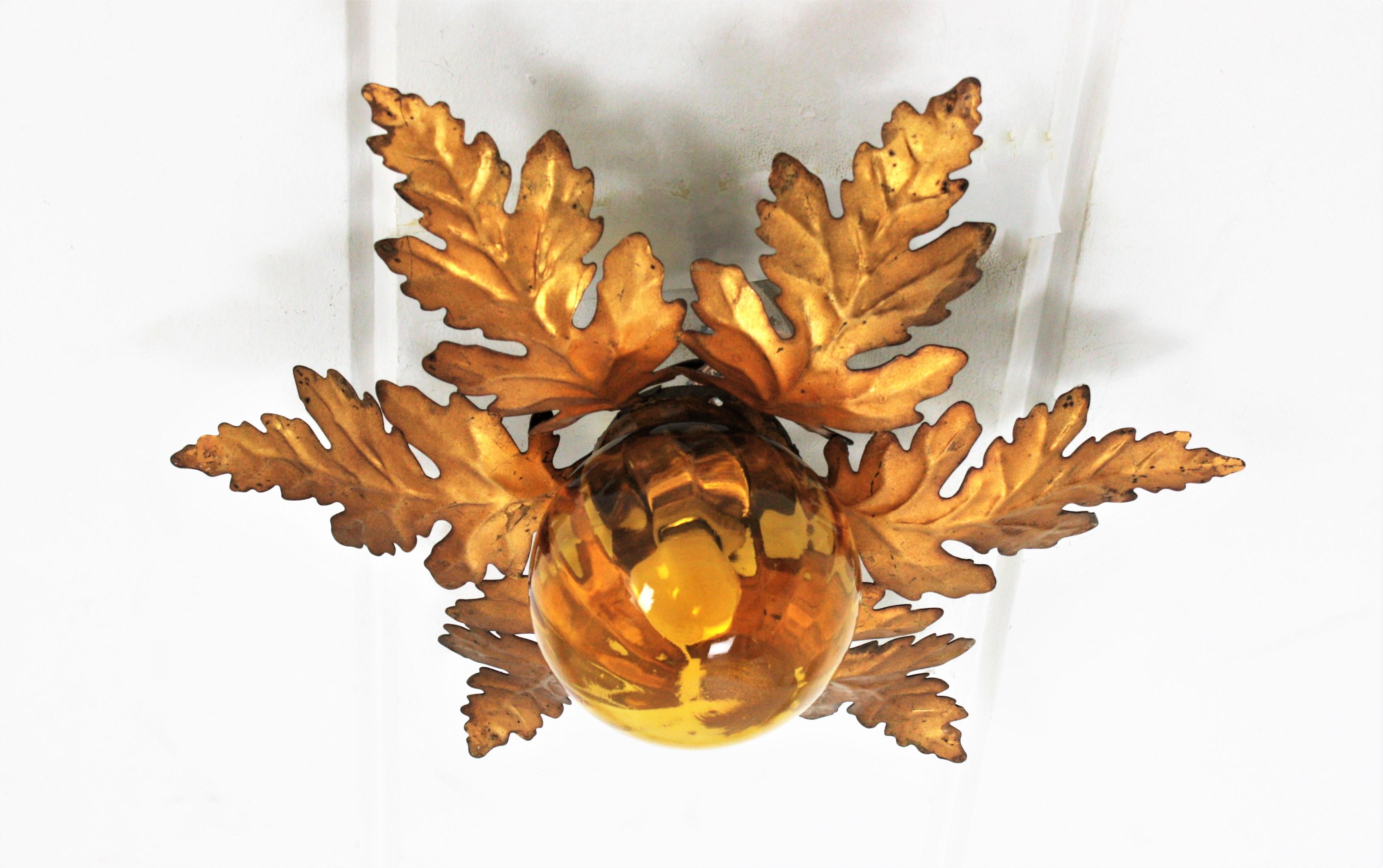 Foliage Sunburst Light Fixture in Gilt Iron with Amber Glass Globe 6