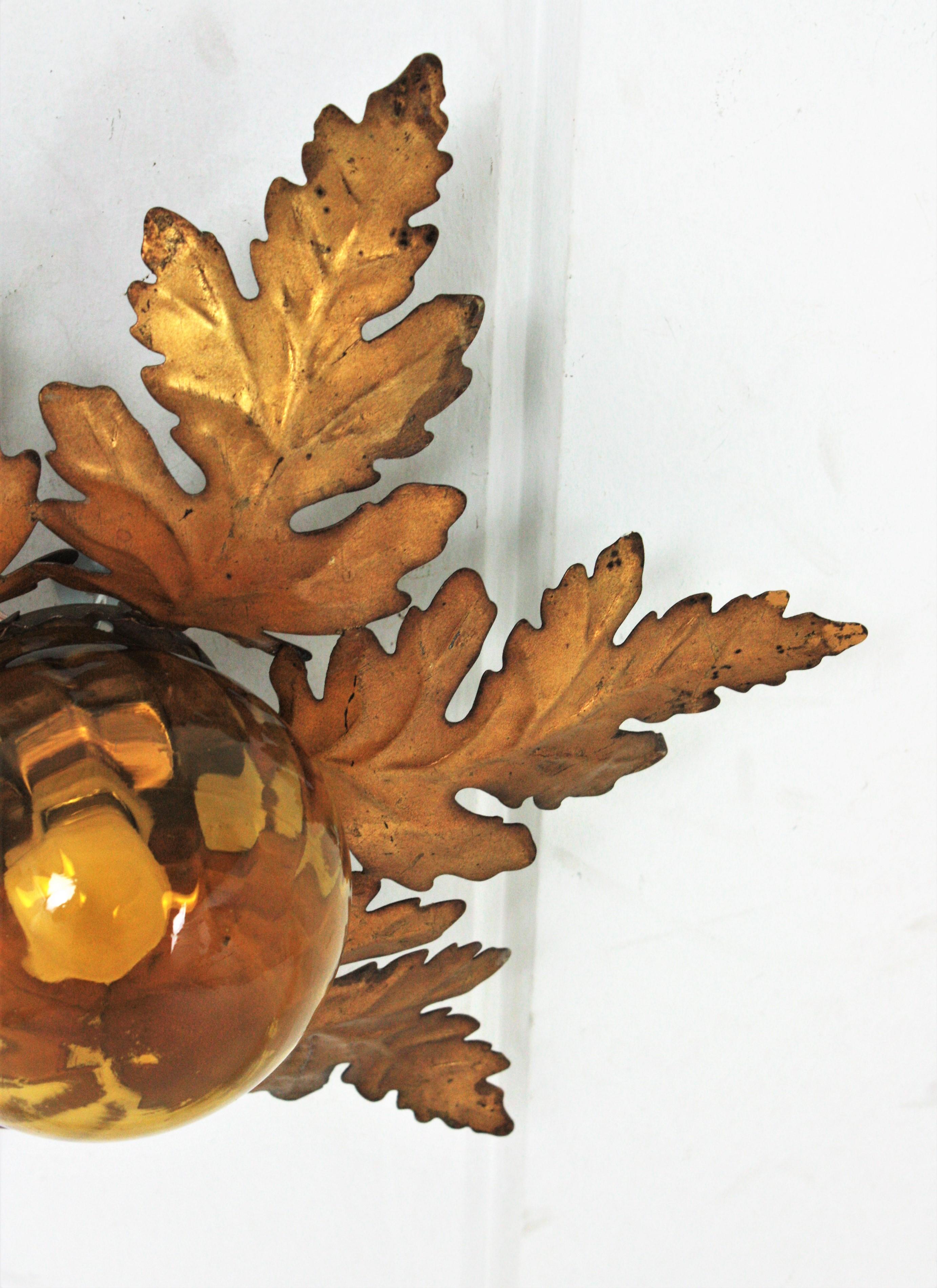 Foliage Sunburst Light Fixture in Gilt Iron with Amber Glass Globe 8