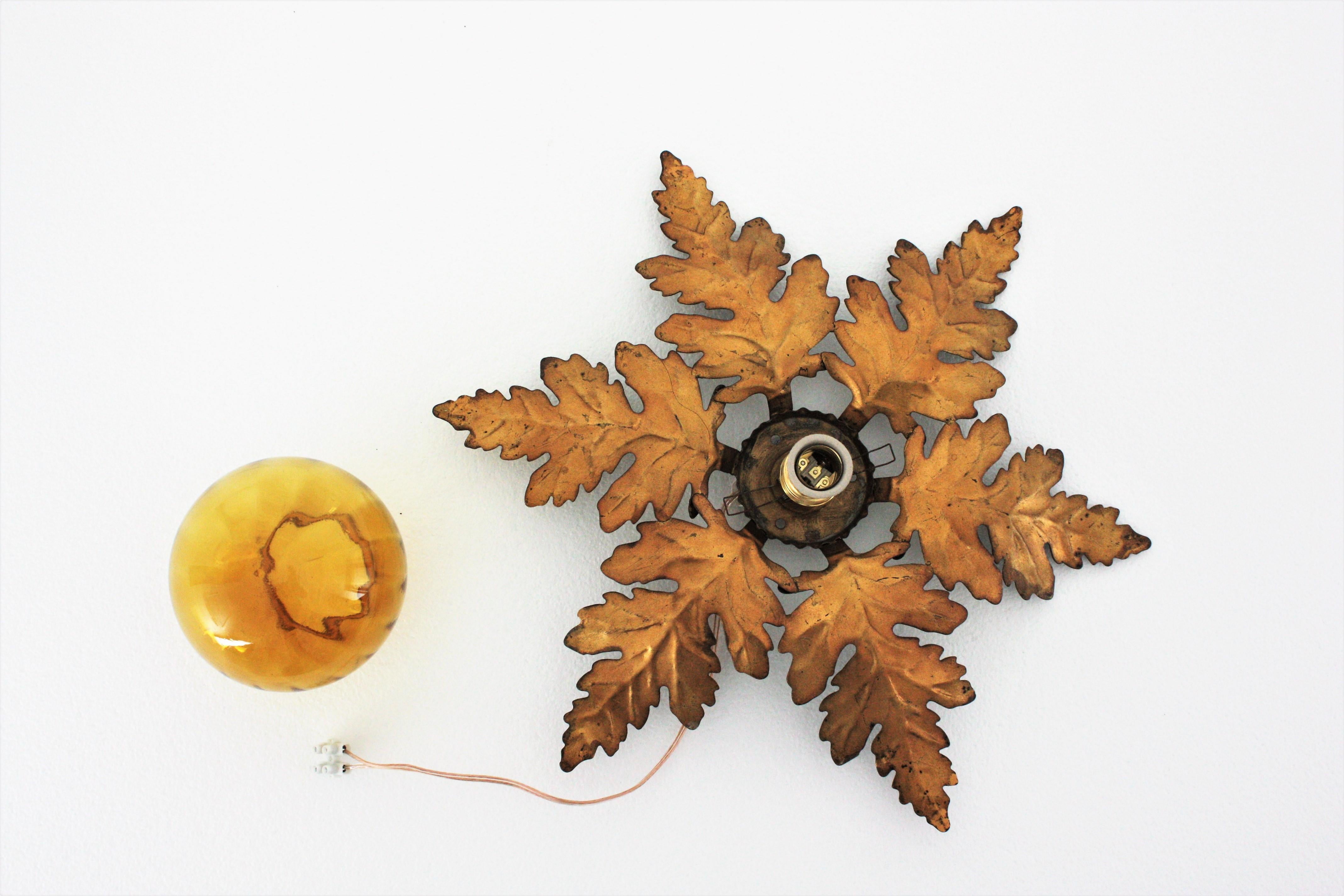 Foliage Sunburst Light Fixture in Gilt Iron with Amber Glass Globe 9