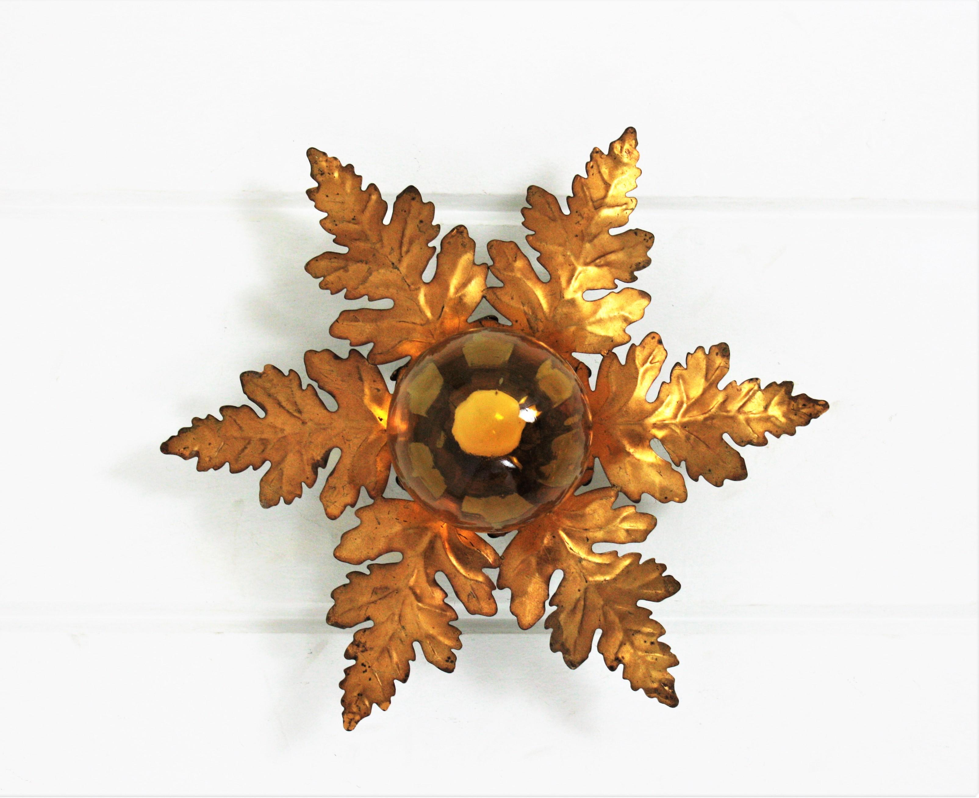 Mid-Century Modern Foliage Sunburst Light Fixture in Gilt Iron with Amber Glass Globe