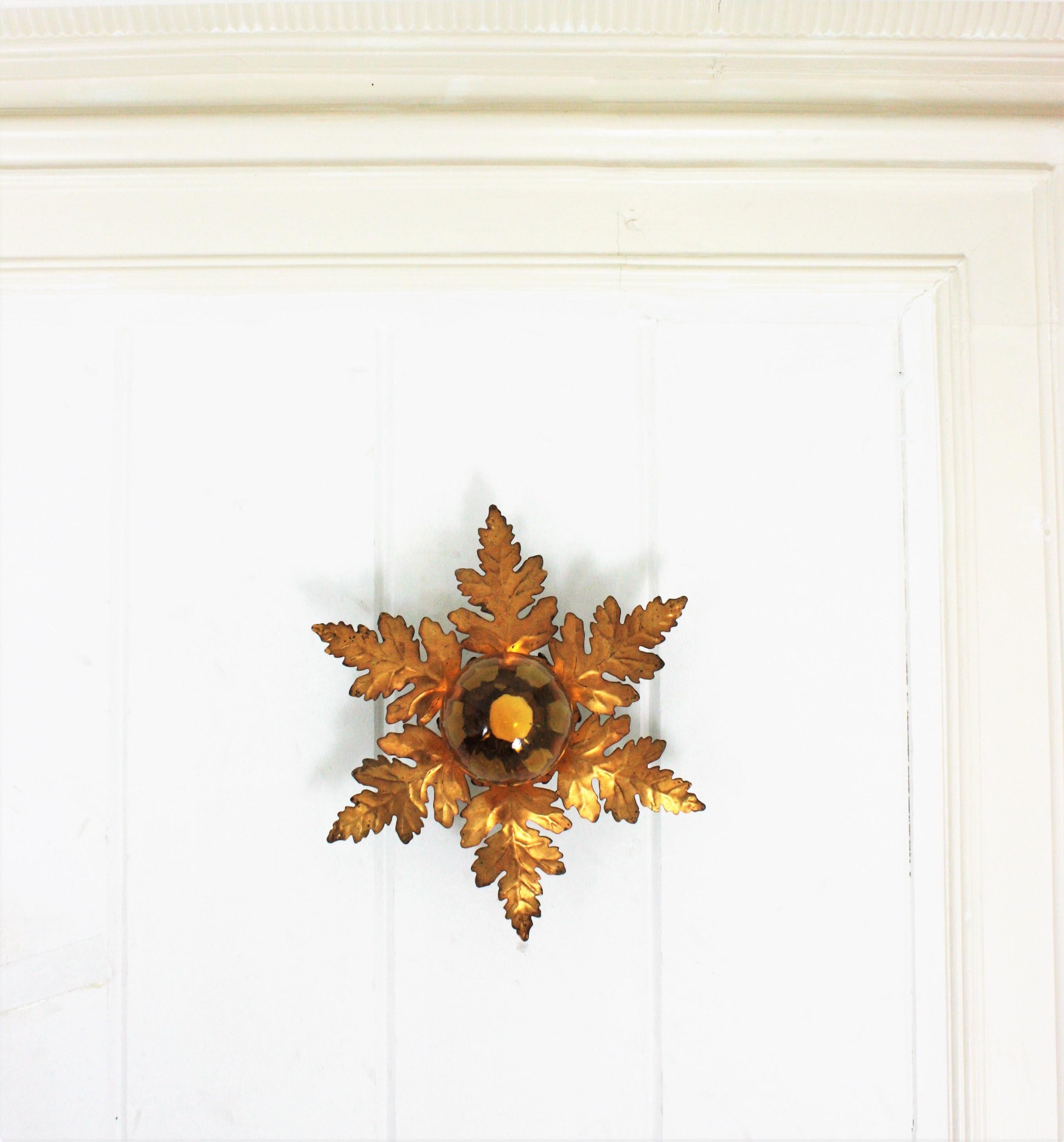 Spanish Foliage Sunburst Light Fixture in Gilt Iron with Amber Glass Globe