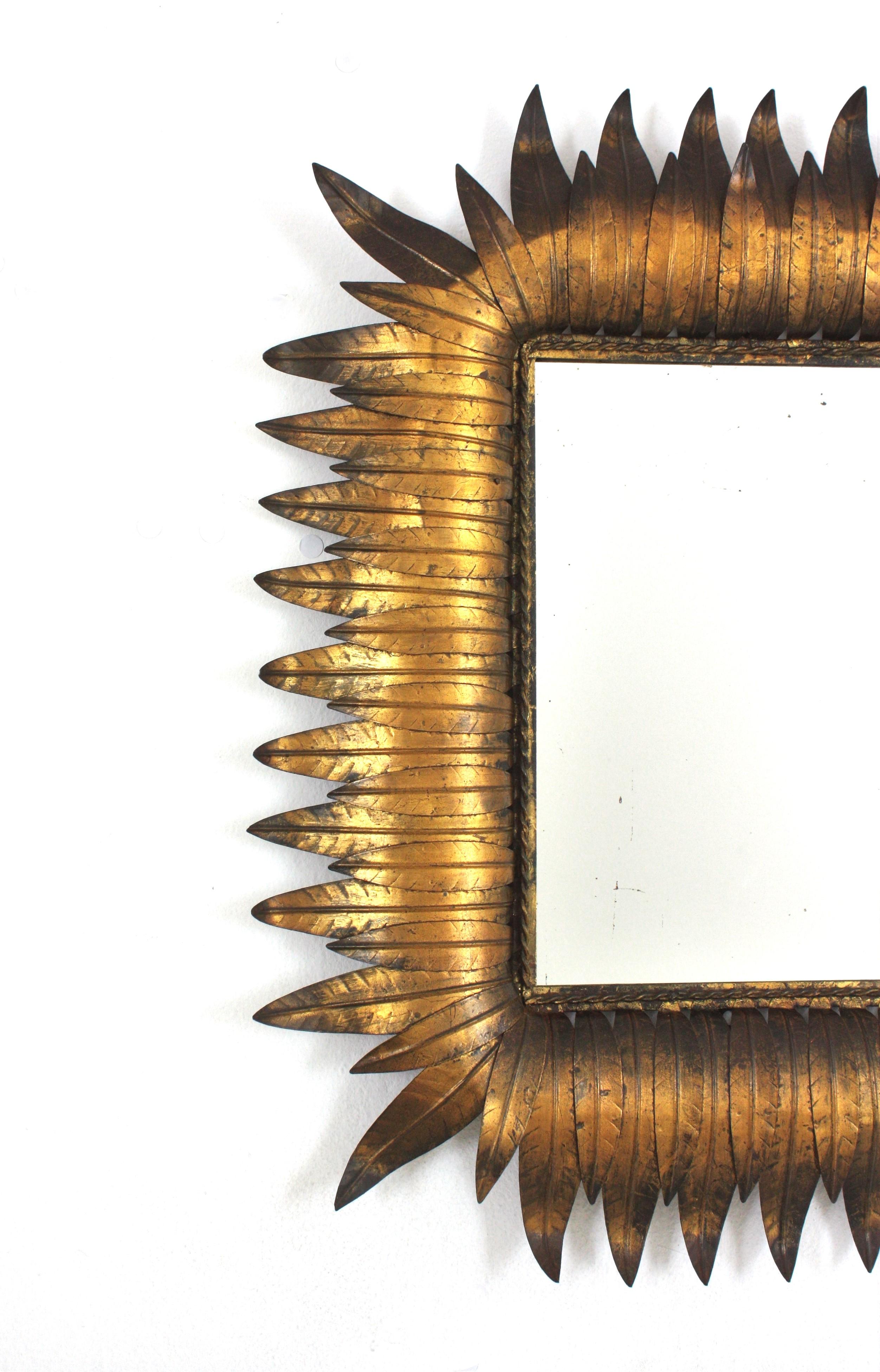 XX secolo Specchio rettangolare Foliage Sunburst in ferro dorato, Hollywood Regency in vendita