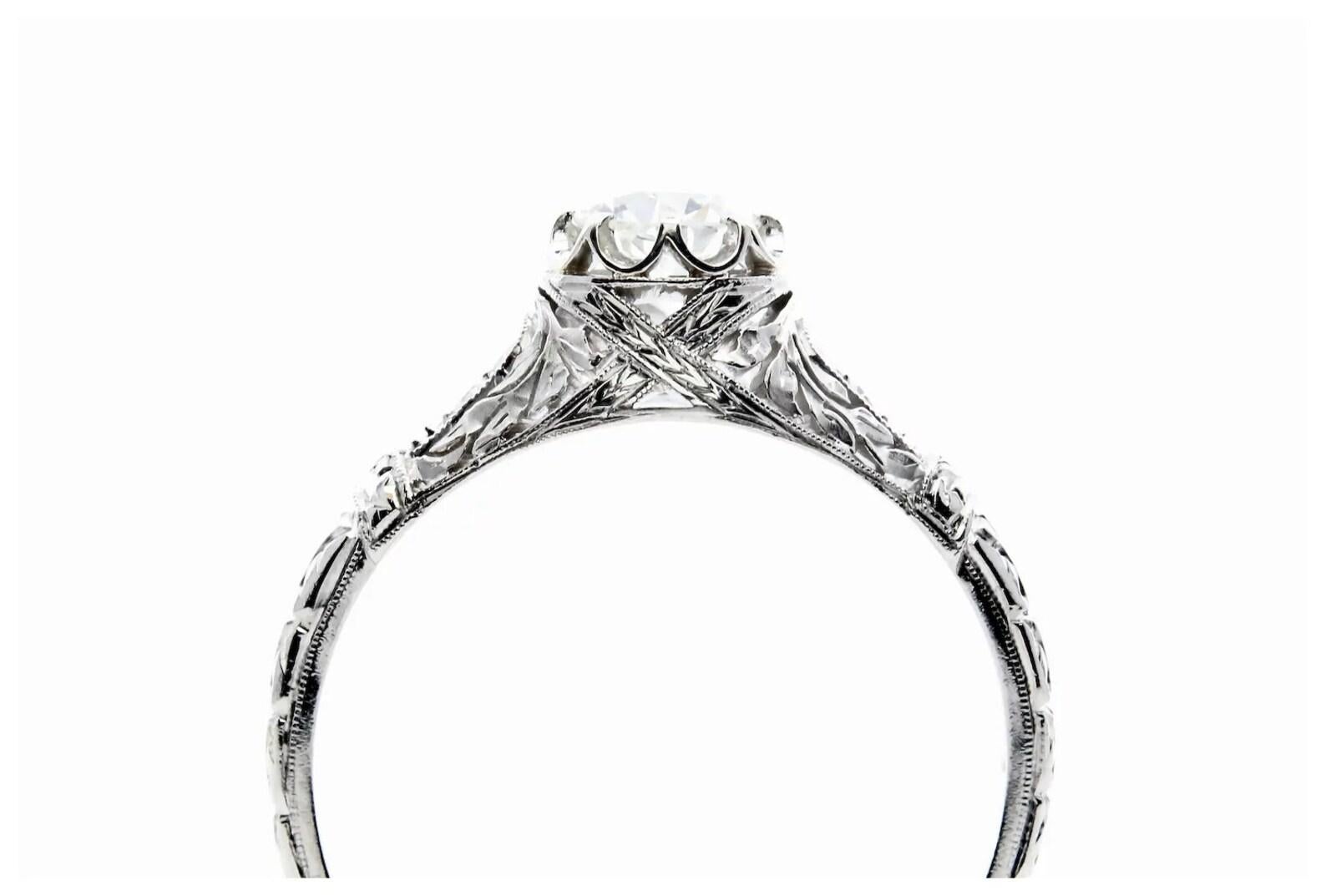 Foliate Motif Art Deco 0.78ctw Diamond Engagement Ring in Platinum In Good Condition For Sale In Boston, MA