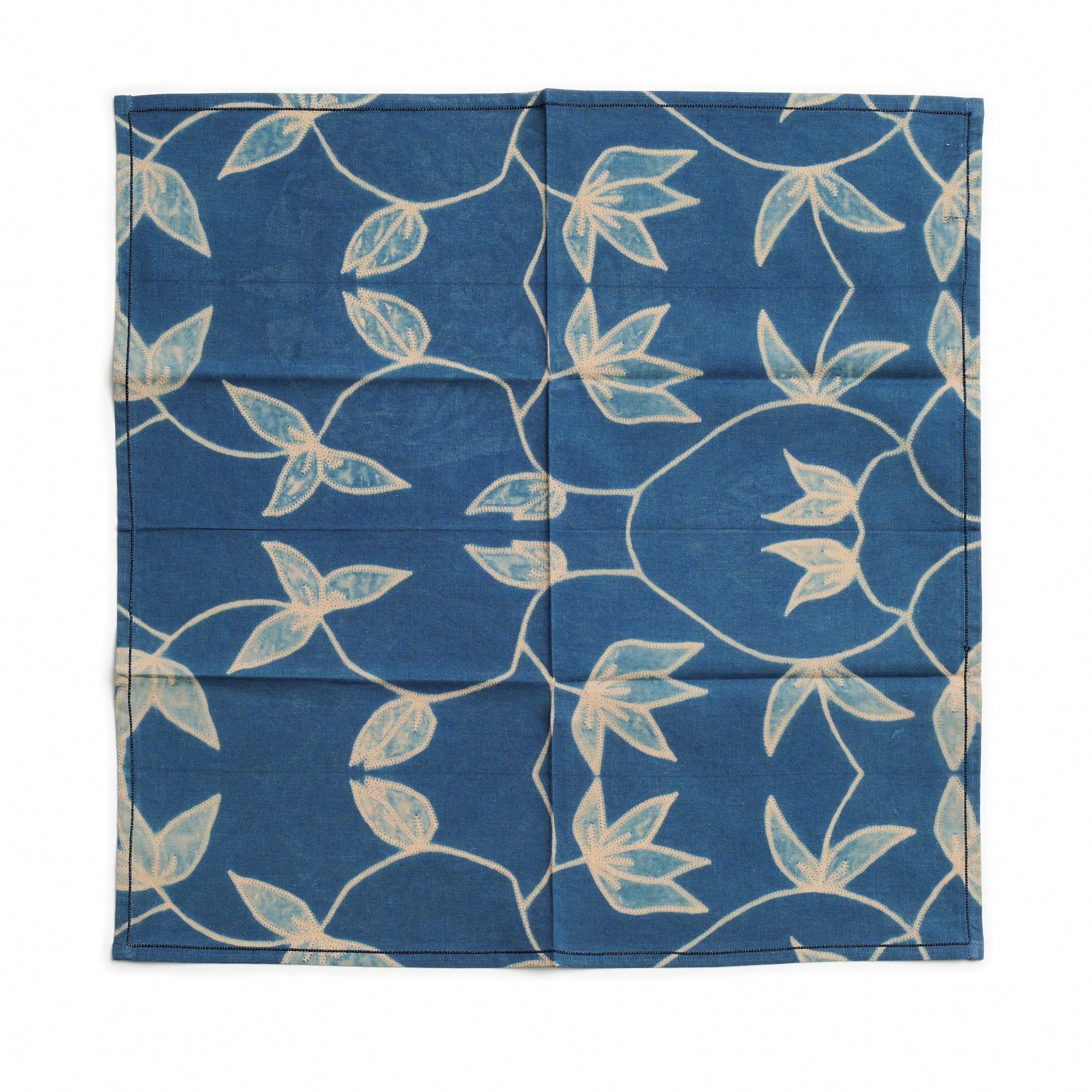 Folio Indigo  table napkin is a unique modern artisanal napkin. Created artistically and ethically by artisans in India using shibori  print technique, using only pure natural dyes. It is a pure statement piece that adds modern and timeless quality