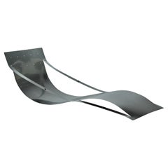 Folio Lounger by Kutarq Studio