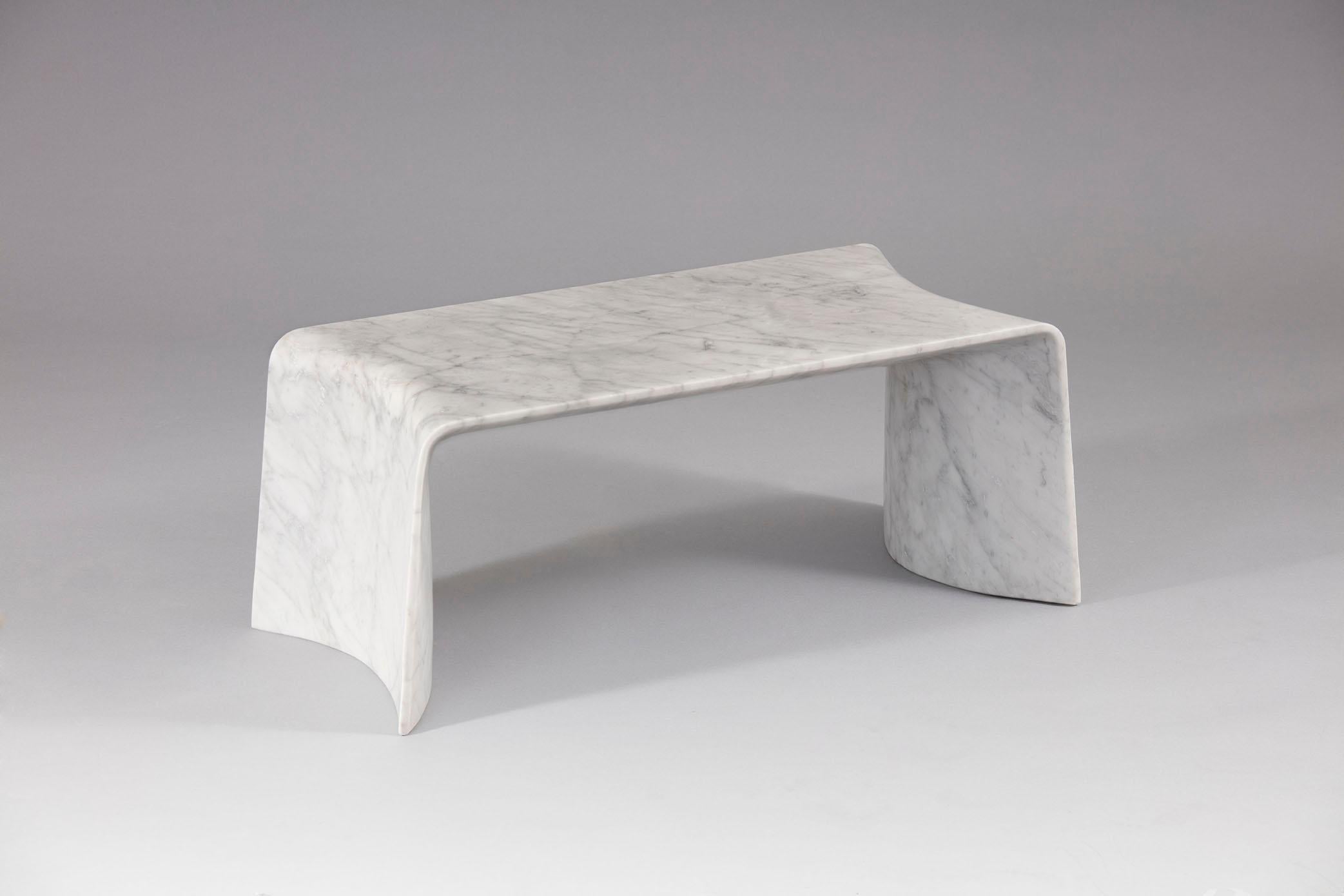 Marble is commonly perceived as heavy and inflexible
Folio turns this notion of marble on it’s head - cut from a solid block yet thin as paper.
Slim 10mm silhouette running along the edge of this dynamic table.

Design by Daniel Fintzi

FORMAR -
