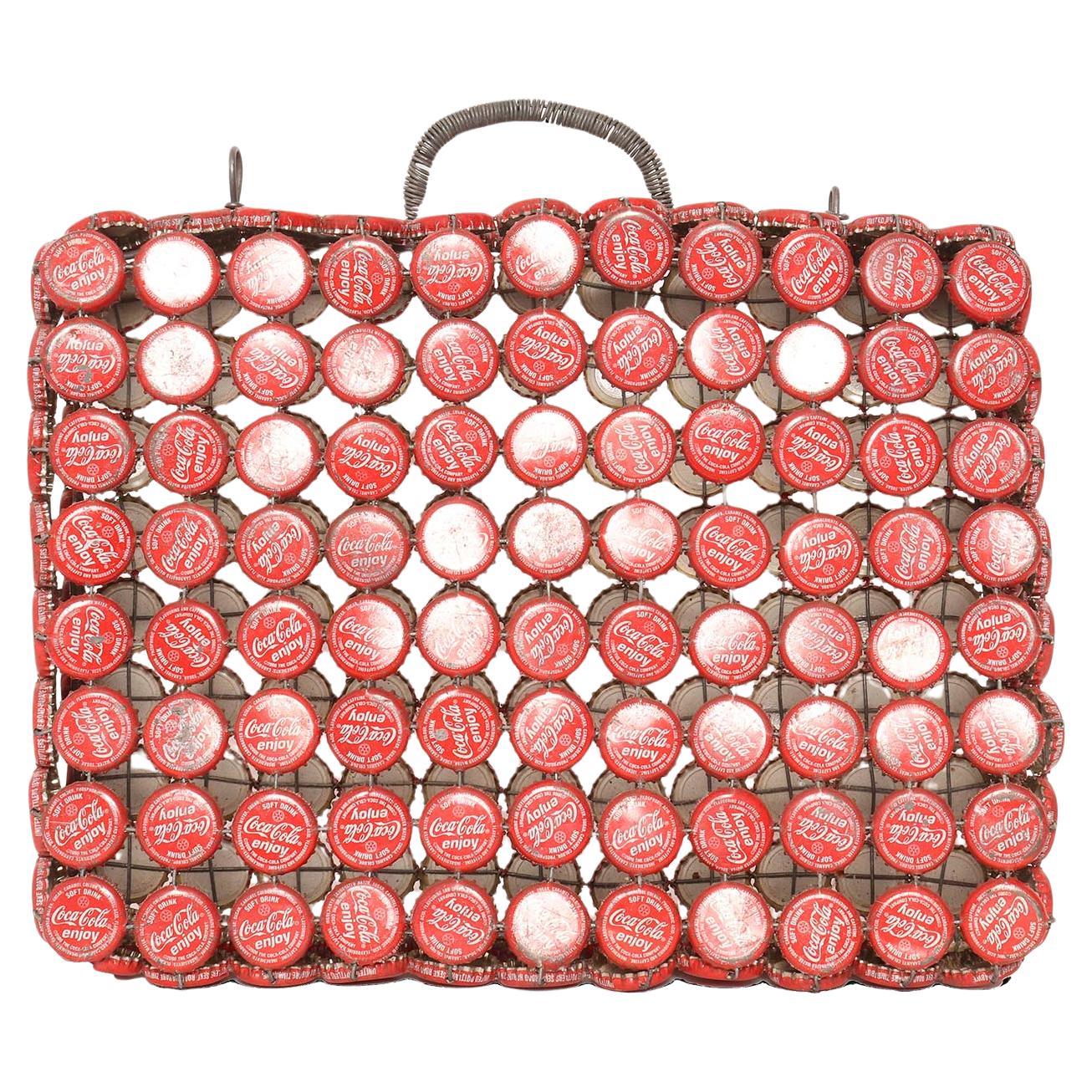 Sac Folk Art, fabriqué à partir de capsules de Coca Cola. Burkina Faso, fin des années 80. en vente