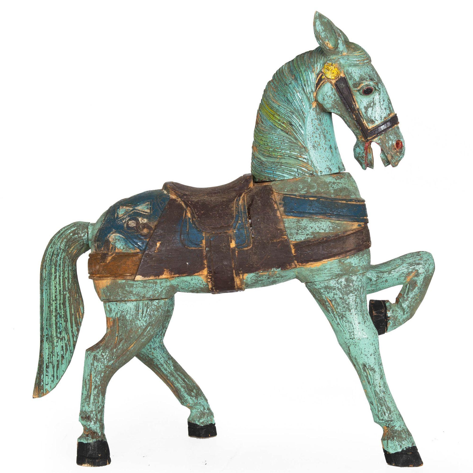 FOLK ART PAINTED AND CARVED WOOD HORSE
20th century, unsigned, designed to be entirely disassembled
Item # 305FEB10P 

An incredibly fun and playful carved and painted folk art horse, it is a clever design that entirely disassembles. It utilizes