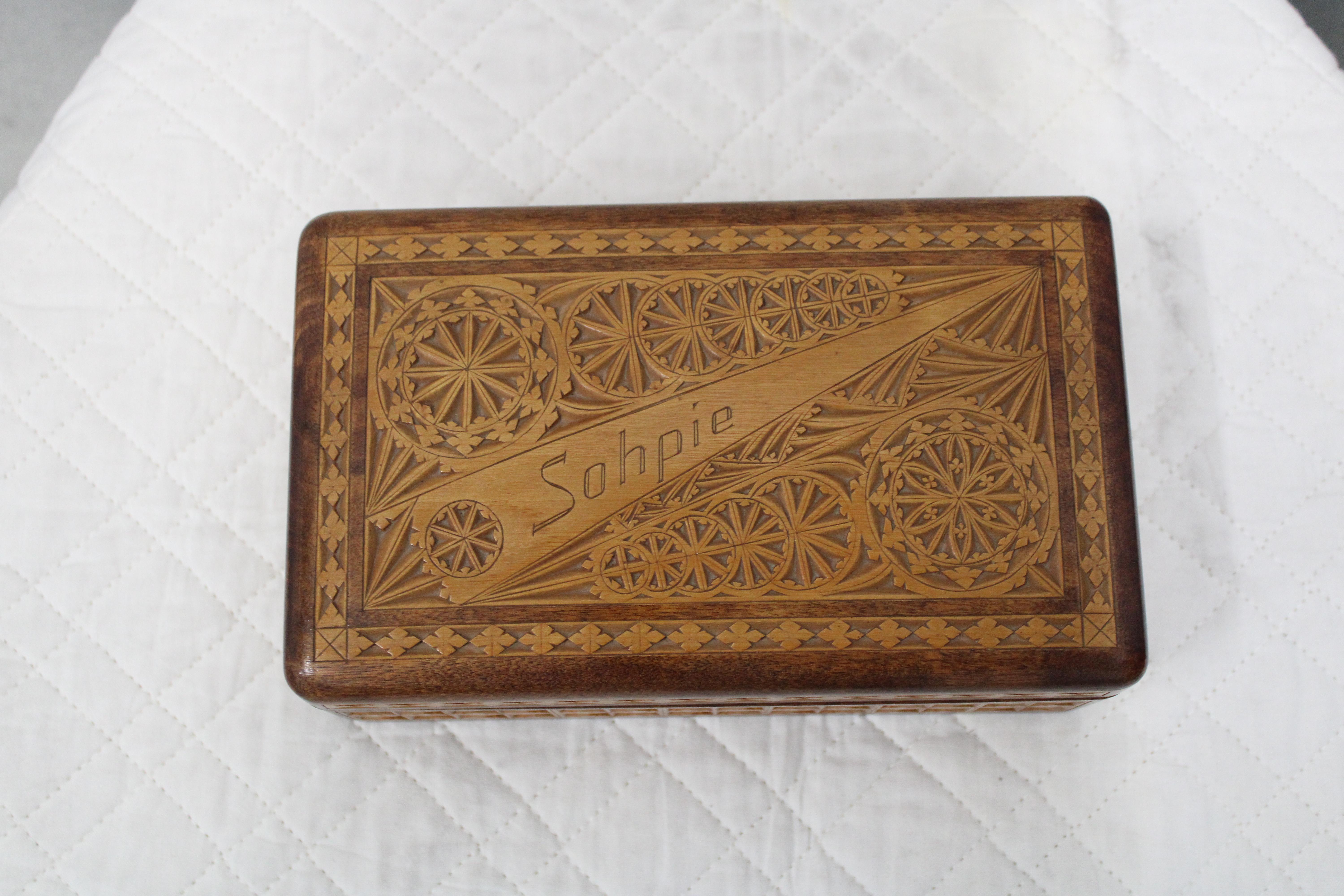 C. 20th Century

Hand carved Folk Art box w/the name Sohpie.  Velvet lined.