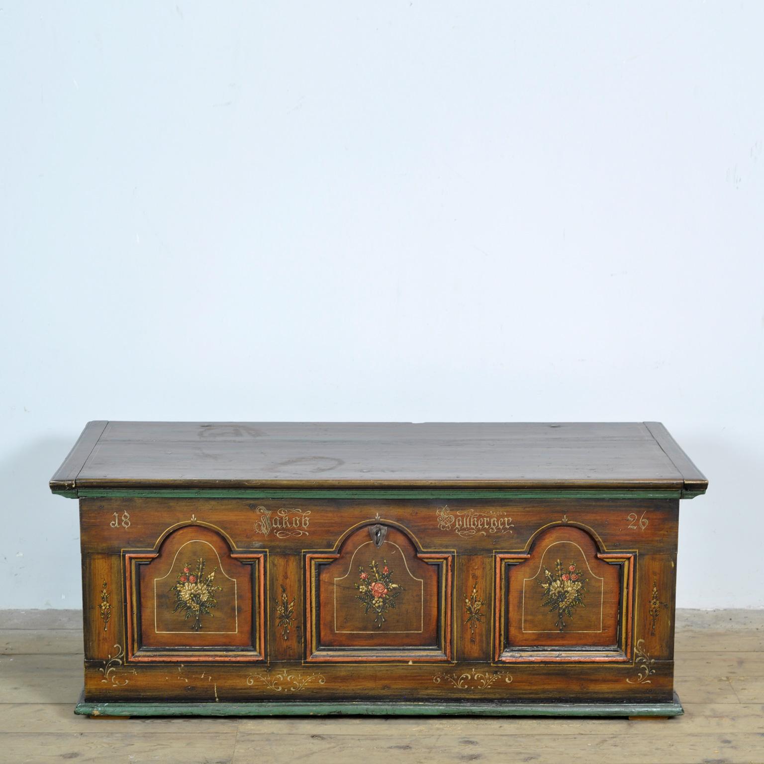 German pine bridal chest made in 1826 for a certain Jacob Sallberger. Hand-painted with beautiful fine details. The iron hinges and handles are hand-forged. The key and lock are original. There is a compartment on the inside for valuables.