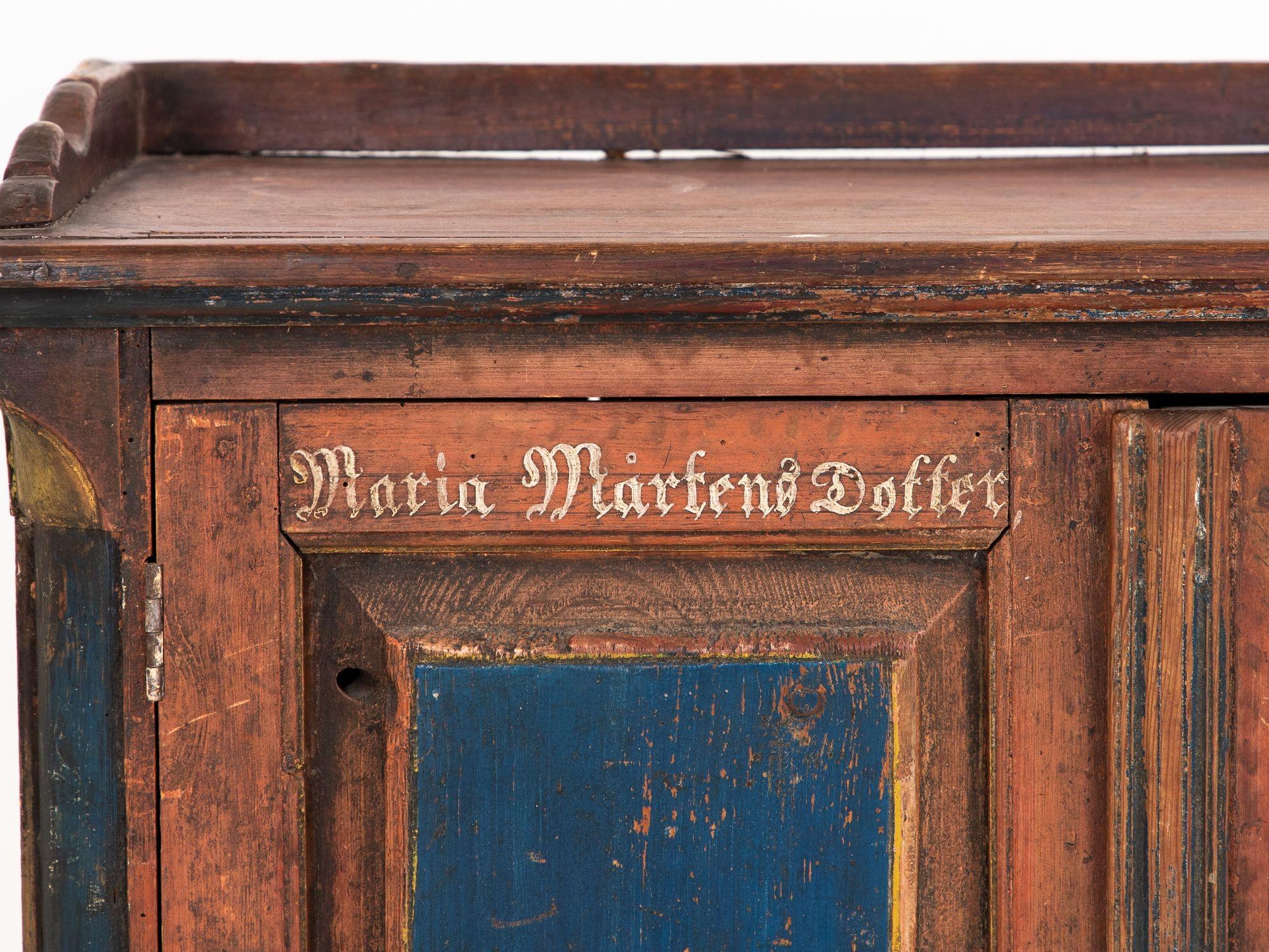 This charming Germanic wedding cabinet, dated 1884 and inscribed 