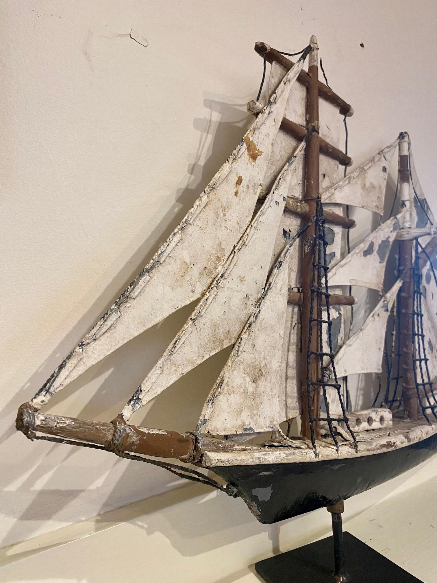 Folk Art Brigantine Weathervane by Frank Adams (1871 - 1944), West Tisbury, Martha's Vineyard, circa 1930s, a hand built weathervane of a brigantine with square-rigged foremast and fore-and-aft-rigged mainmast, with wooden hull, characteristic cut