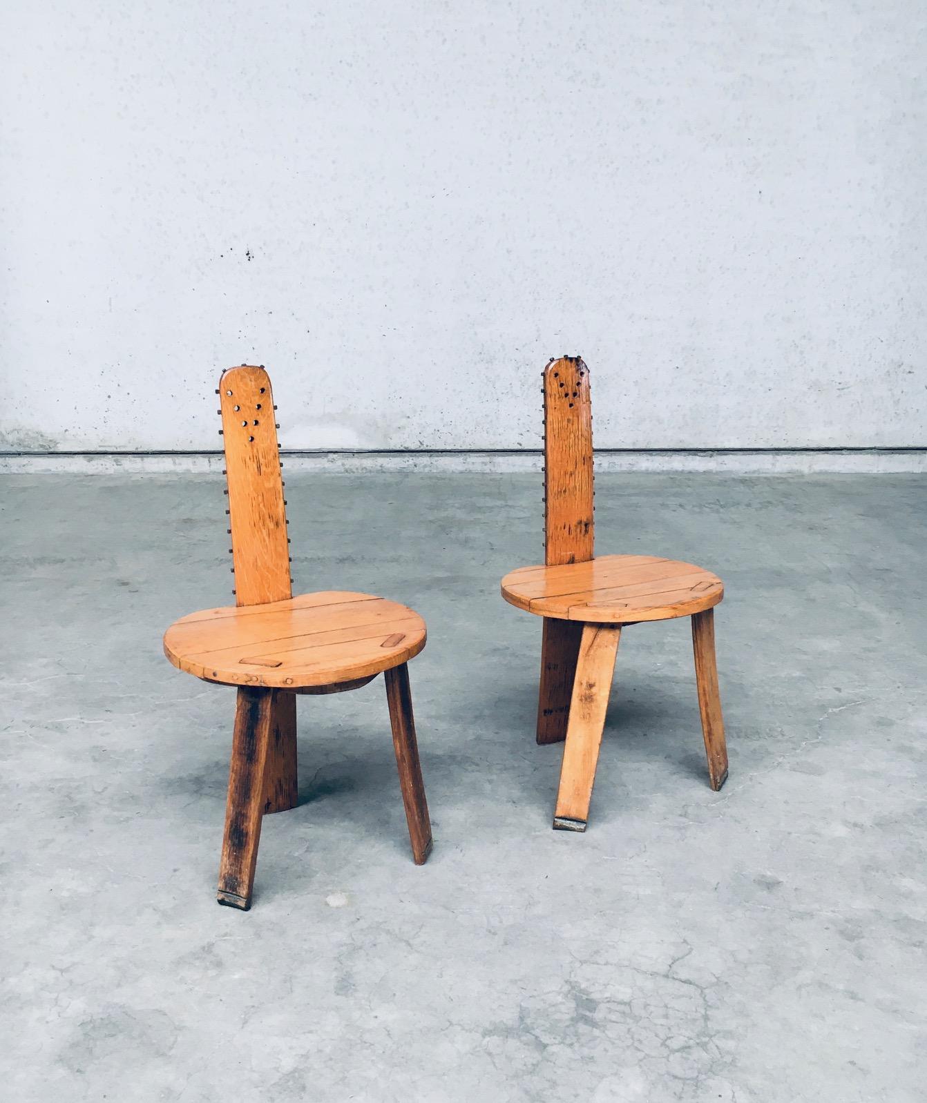 Vintage French Folk Art Brutalist Design SAW Back Side Chair set of 2. Made in France, 1960's period. Light oak constructed chairs with Saw model back which has square nails all surrounding and holes in a triangular shape at the top of the backrest.