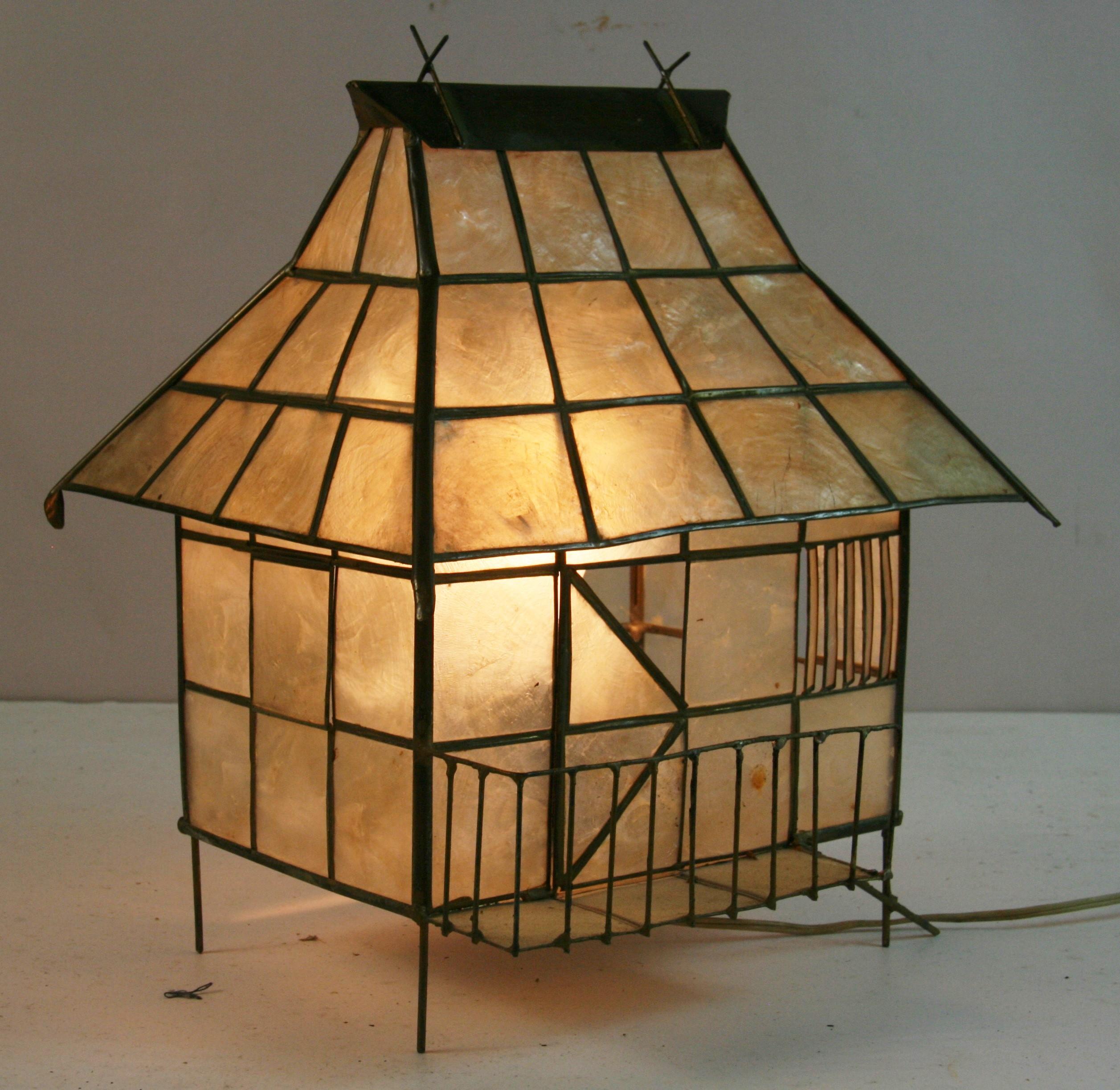 1839 Folk art capiz shell tabl lamp shaped like a cabin
Takes one 60 watt bulb