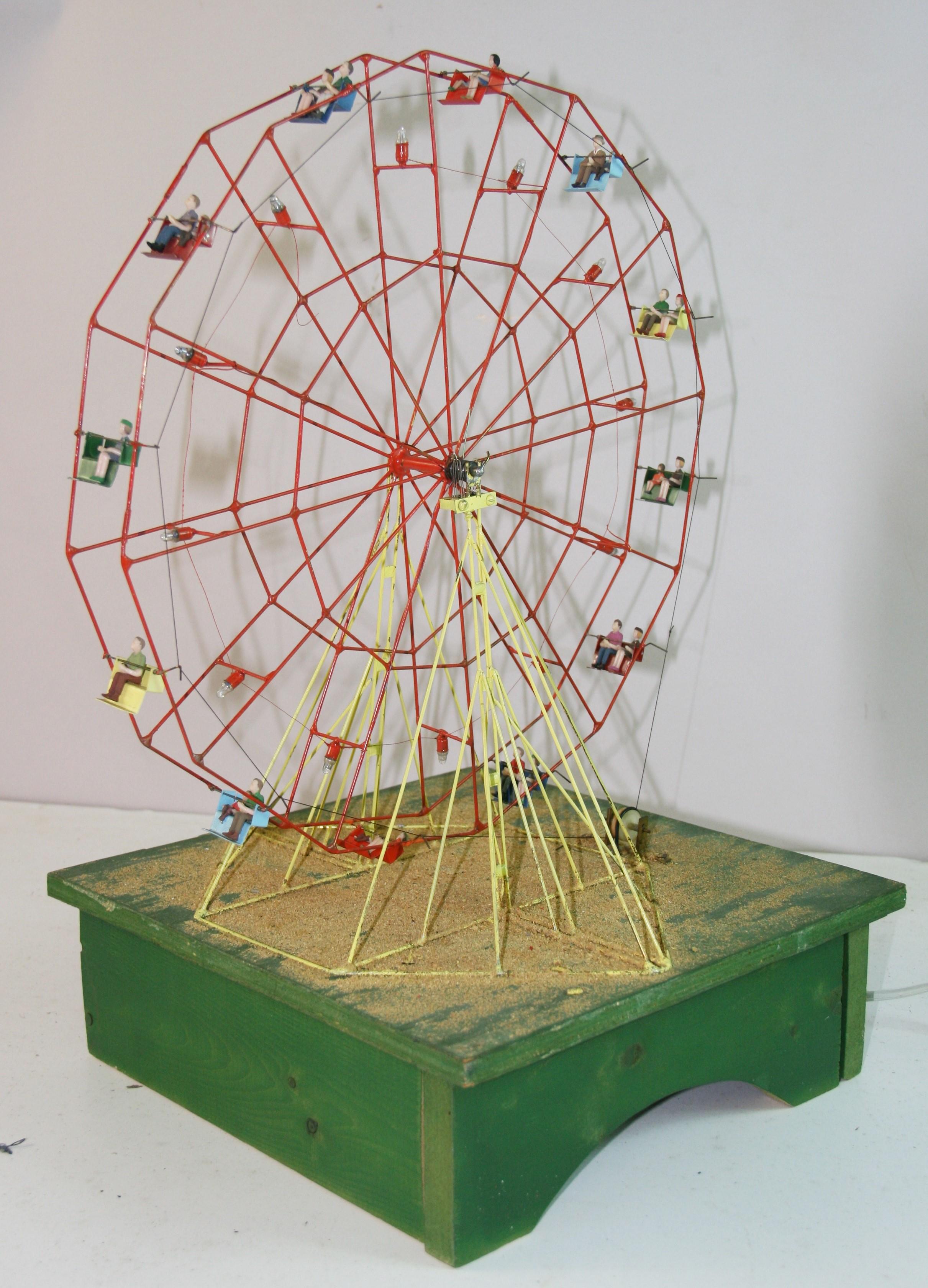 1838 Custom made  Carnival Folk Art motorized ferris wheel .
Rotates with  small lights added set on a wood base