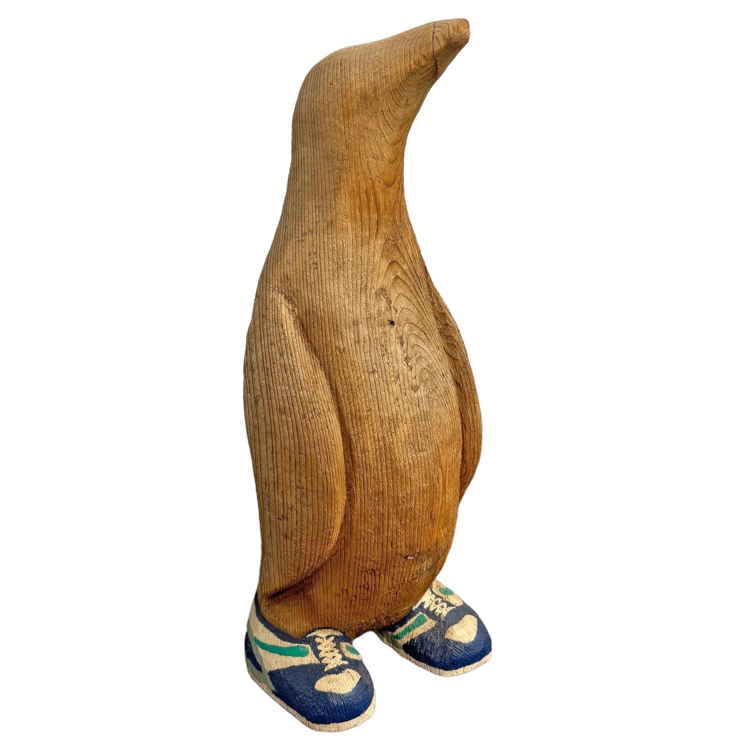 penguin wood carving