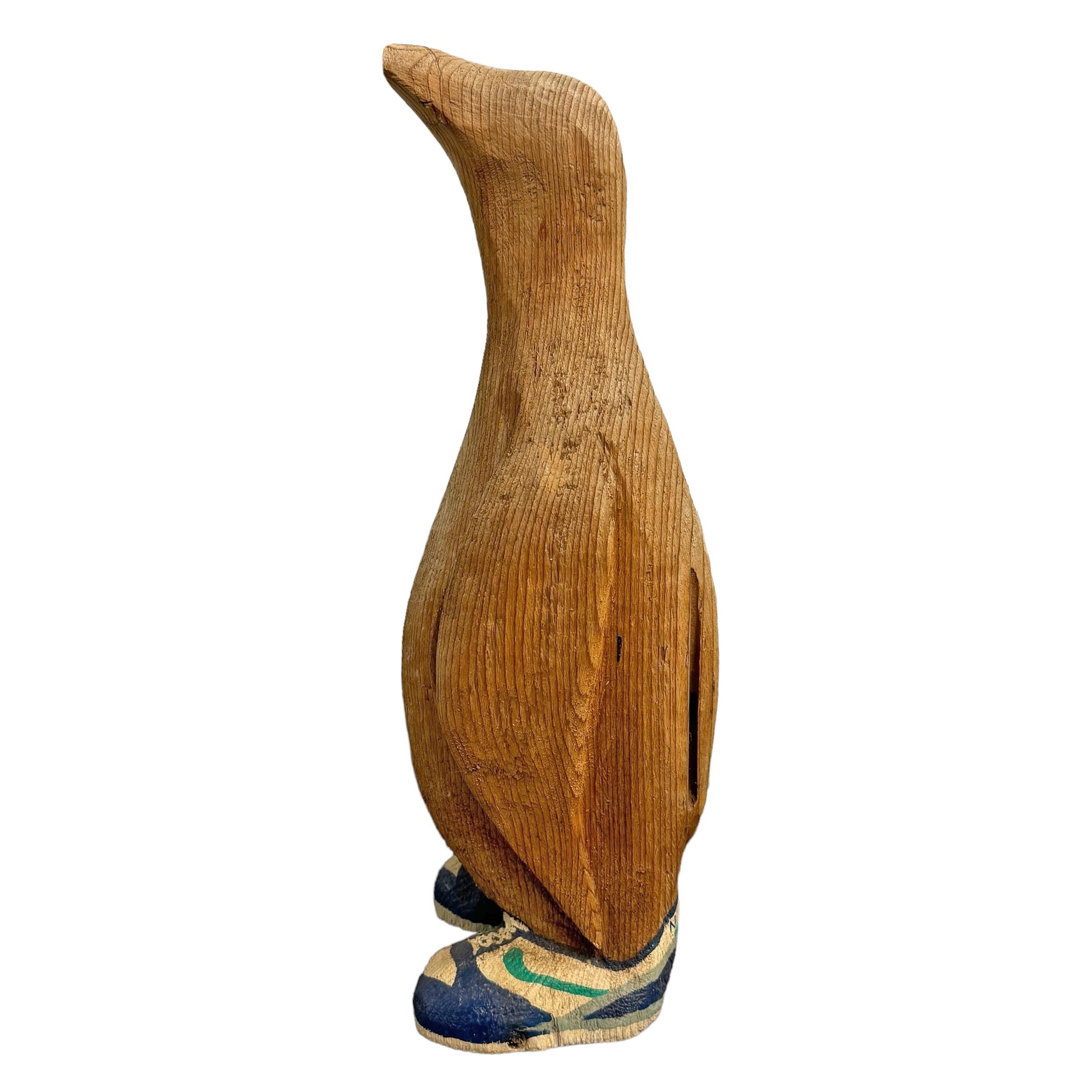 Folk Art Carved Wood Penguin Wearing Nike Shoes In Good Condition In Chicago, IL