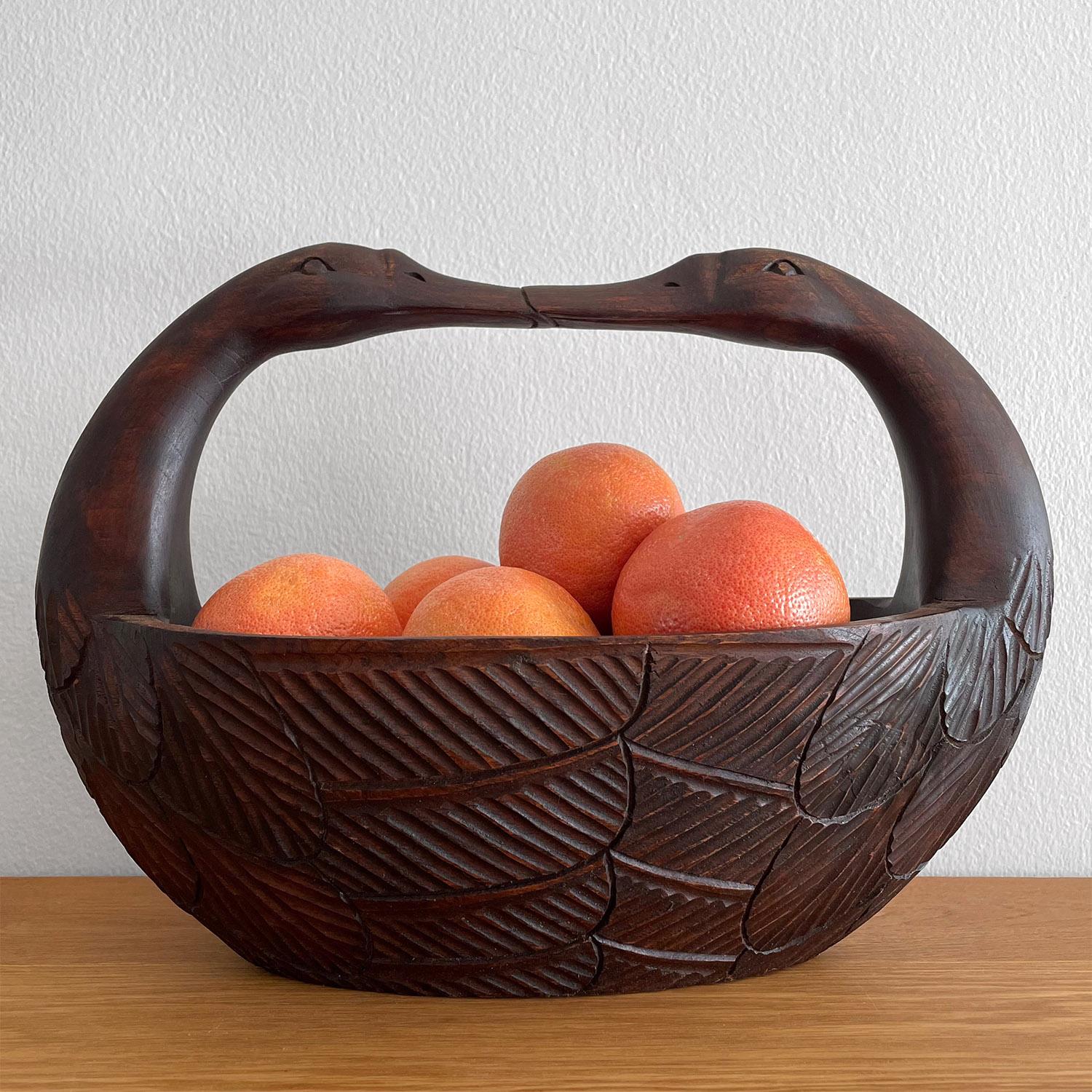 Folk art carved wood swan bowl
This is a stunning statement piece that will be a wonderful addition to any surface
Handcrafted artisanal piece
Carved from a single piece of wood
Wonderful wood grain detail and intricate feather etchings
Minor