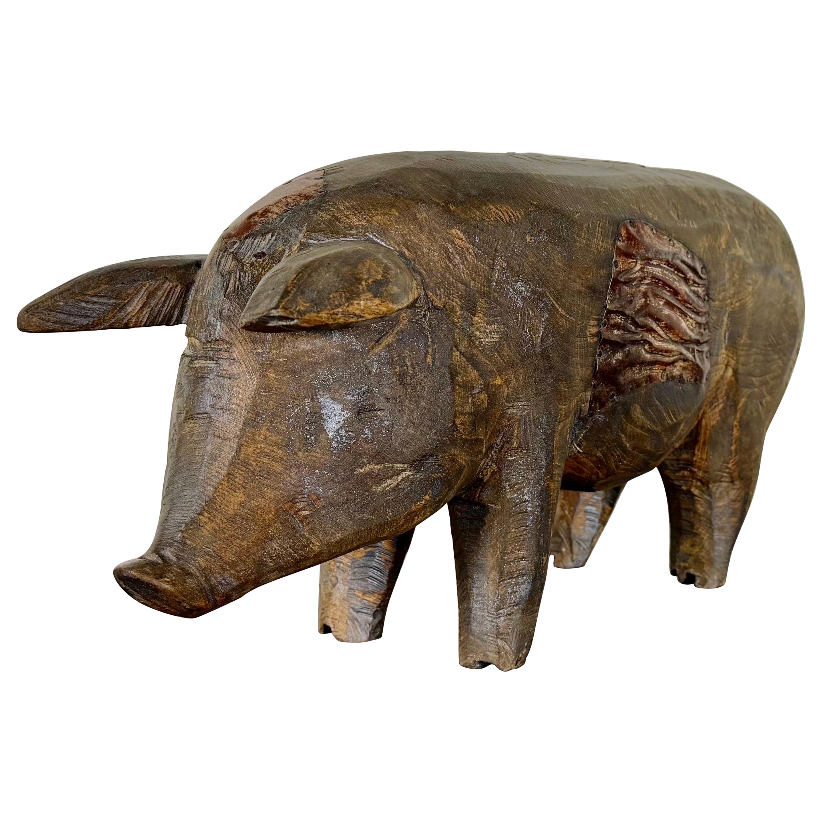 Folk Art Carved Wooden Pig Sculpture with Patinated Finish