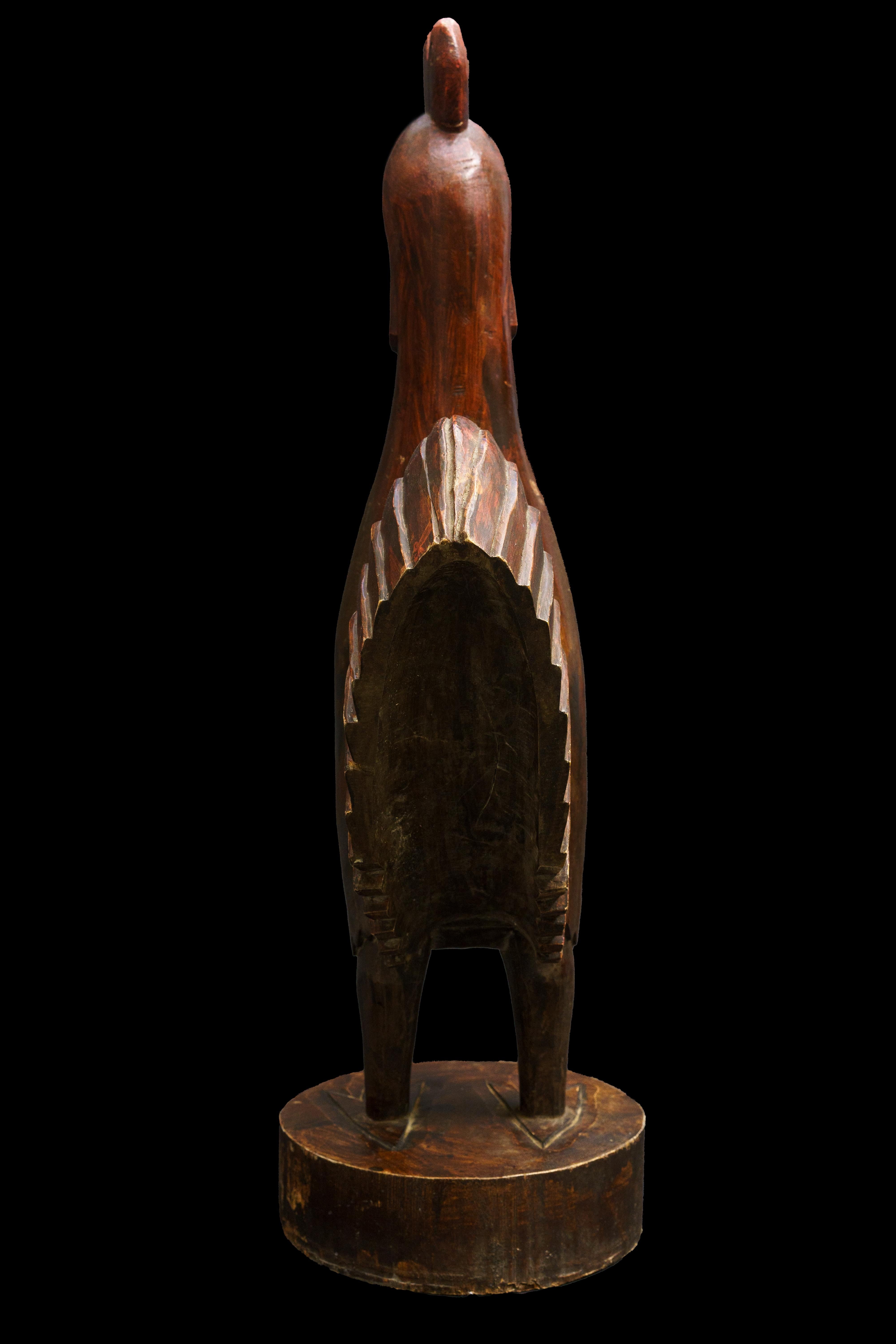 Folk art carving of rooster

Measures approximately: 19