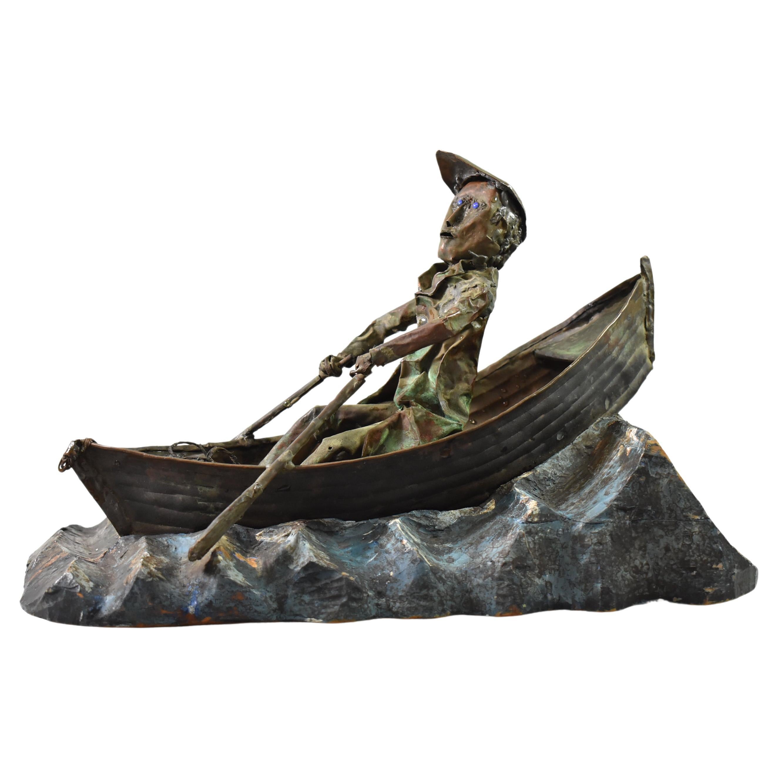 Folk Art Copper Sculpture Man In Row Boat By S.J. Rossbach Circa 1966 For Sale