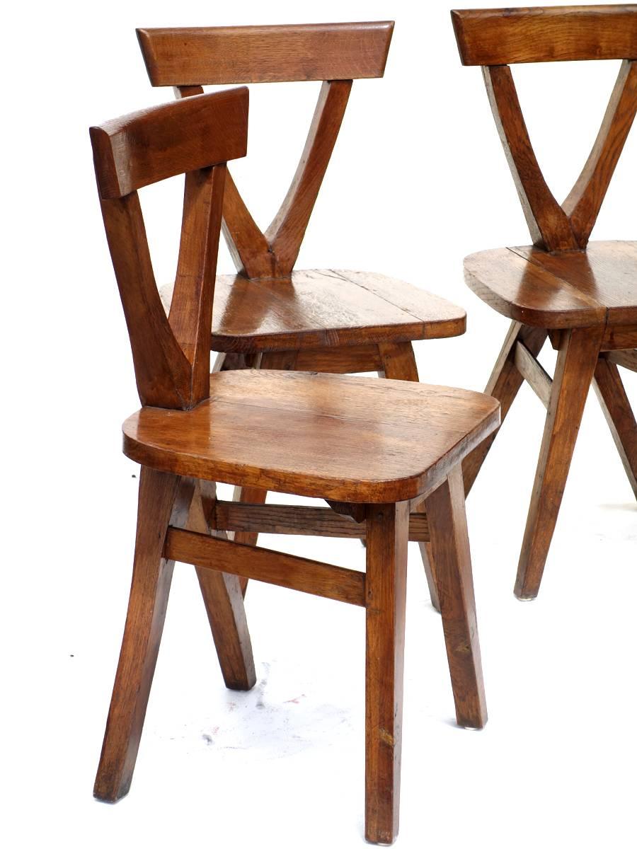 Folk Art Early 20th Century Wood Rustic Four Chairs For Sale 1