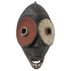 Folk Art Eket Iblbio Styled African Wooden Mask Wall Sculpture