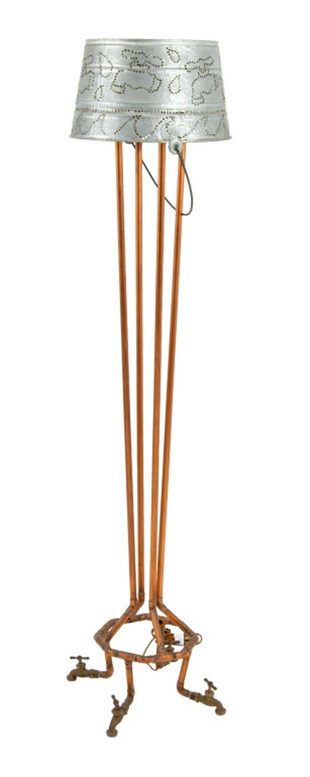 Folk Art Faucet Motif Mixed Metal Floor Lamp, with perforated bucket lampshade atop copper piping terminating in four faucet form feet. Overall: 59.75